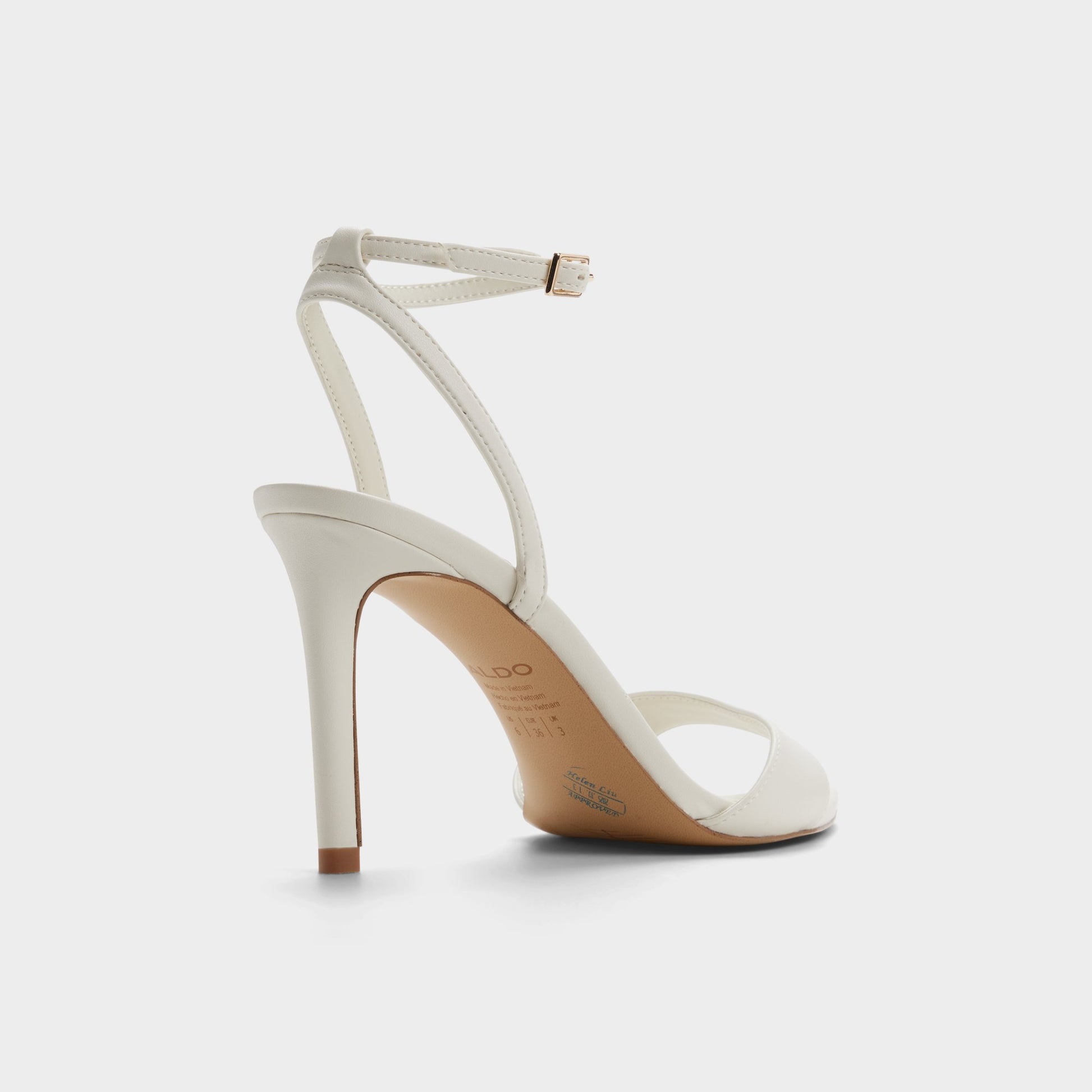 Three-quarter angle of White/bone Leandra Strappy heeled sandal's back side