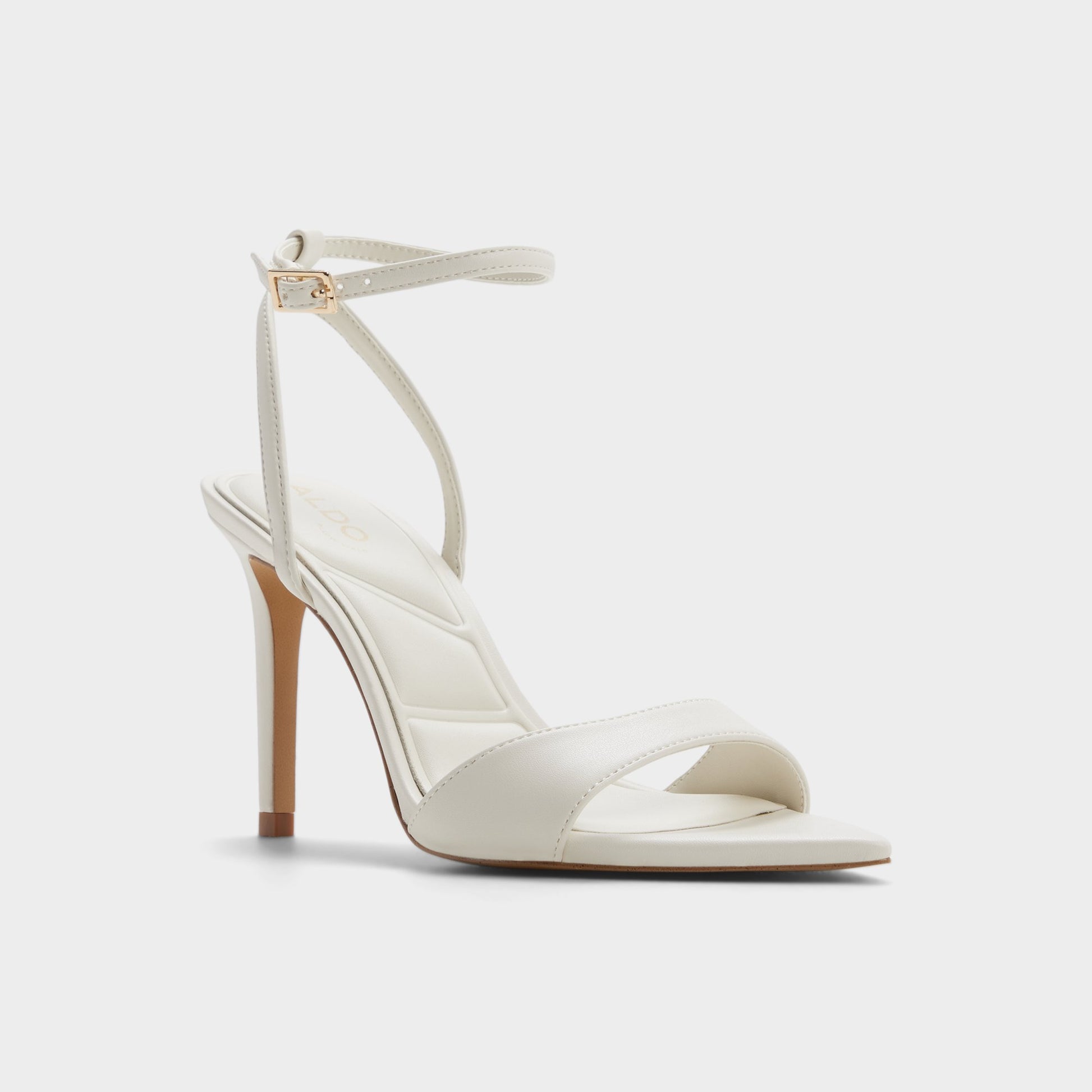 Three-quarter angle of White/bone Leandra Strappy heeled sandal's front side
