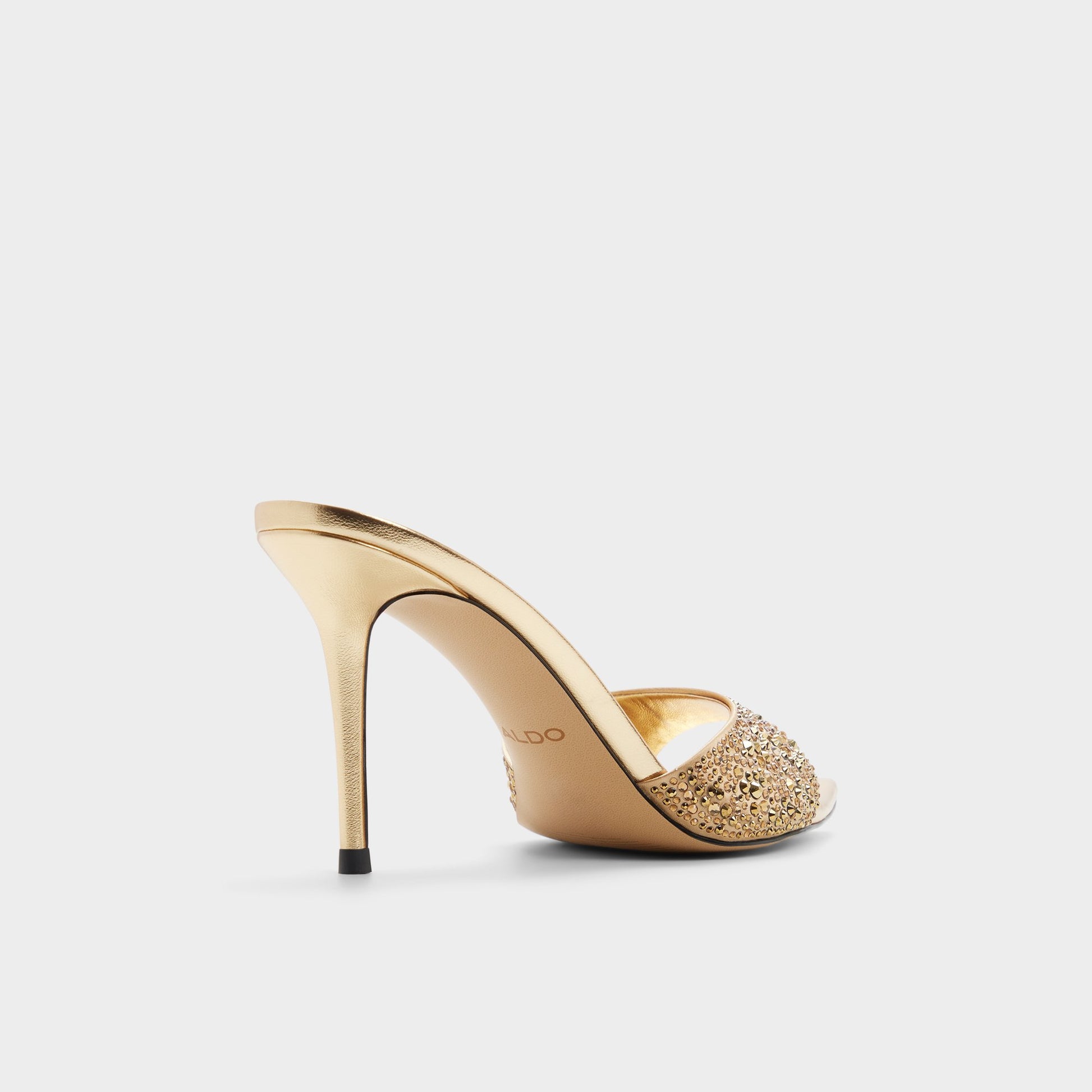 Three-quarter angle of Gold Reanna Heeled mule's back side