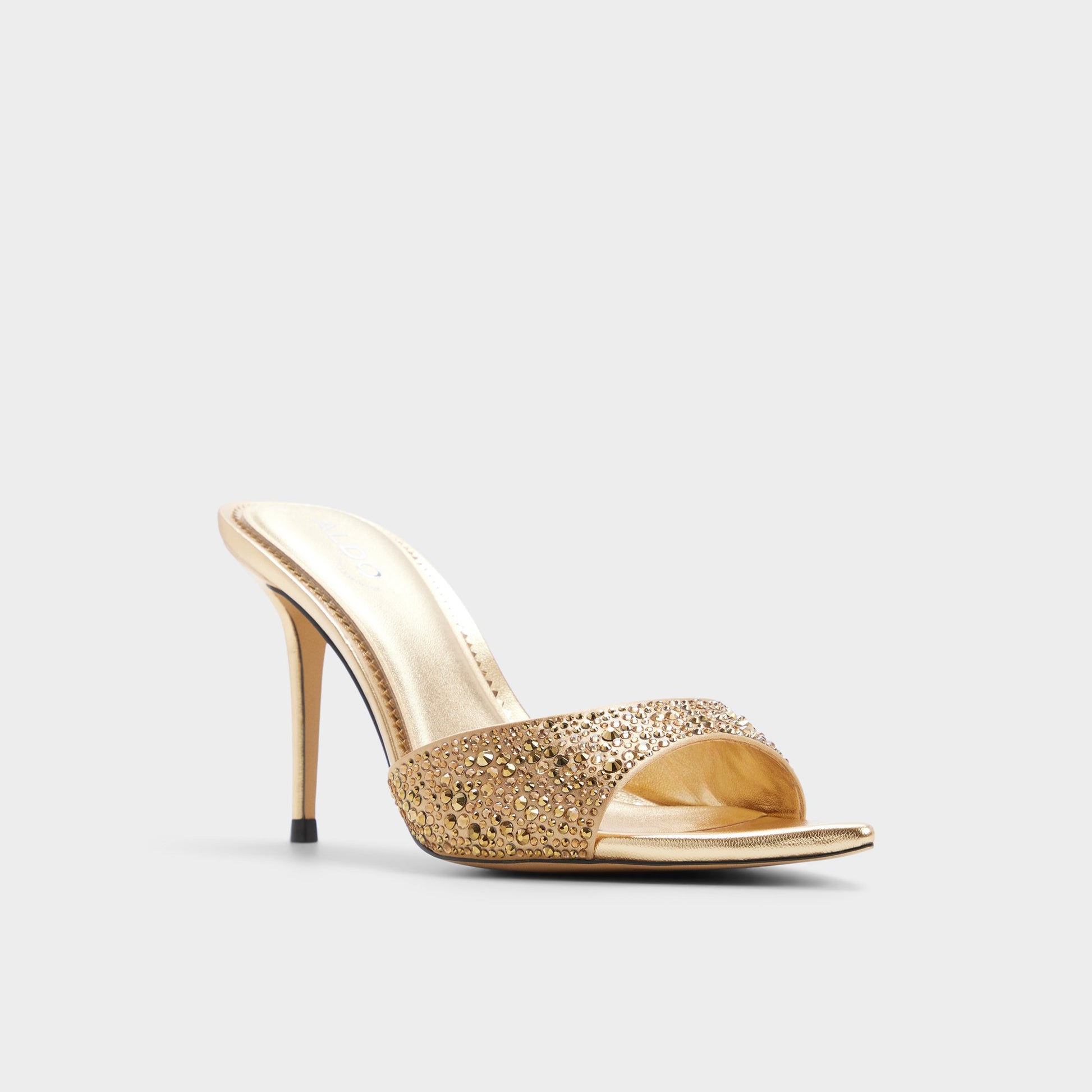 Three-quarter angle of Gold Reanna Heeled mule's front side