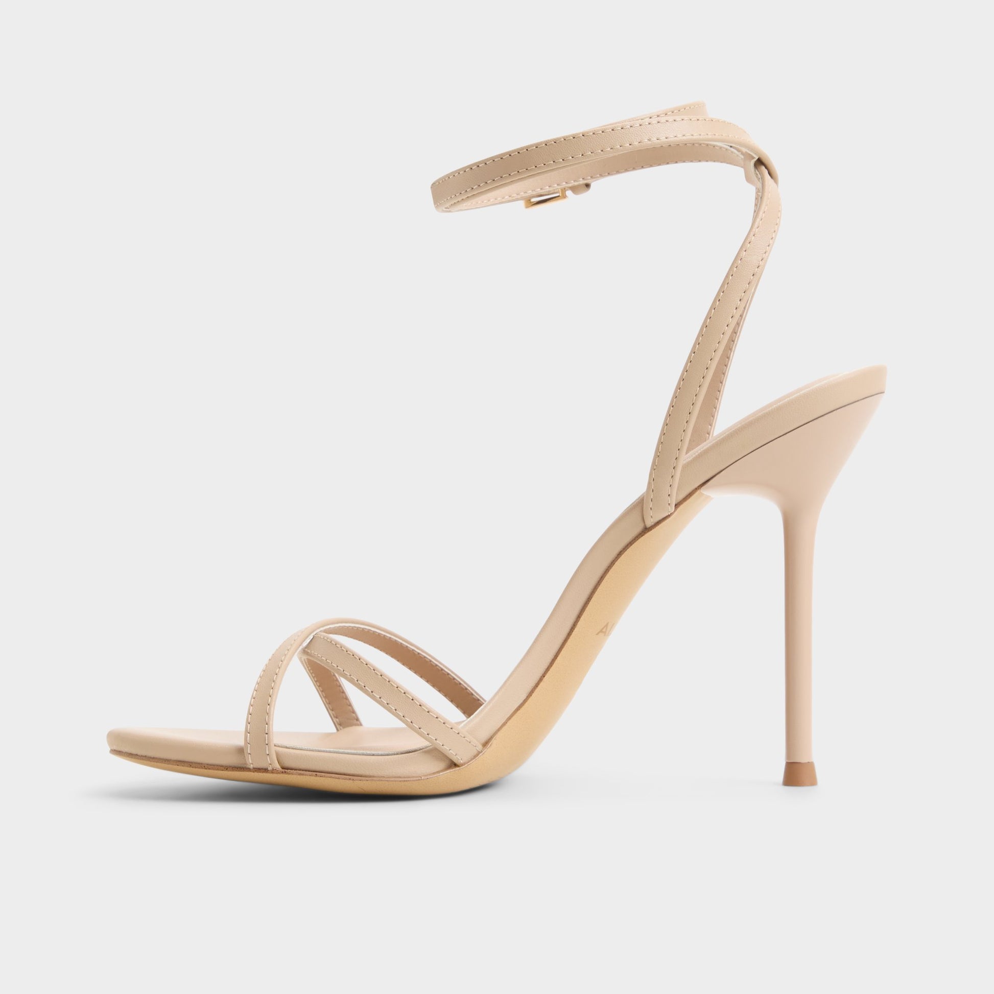 Side view of Tan Manaelion Strappy heeled sandal