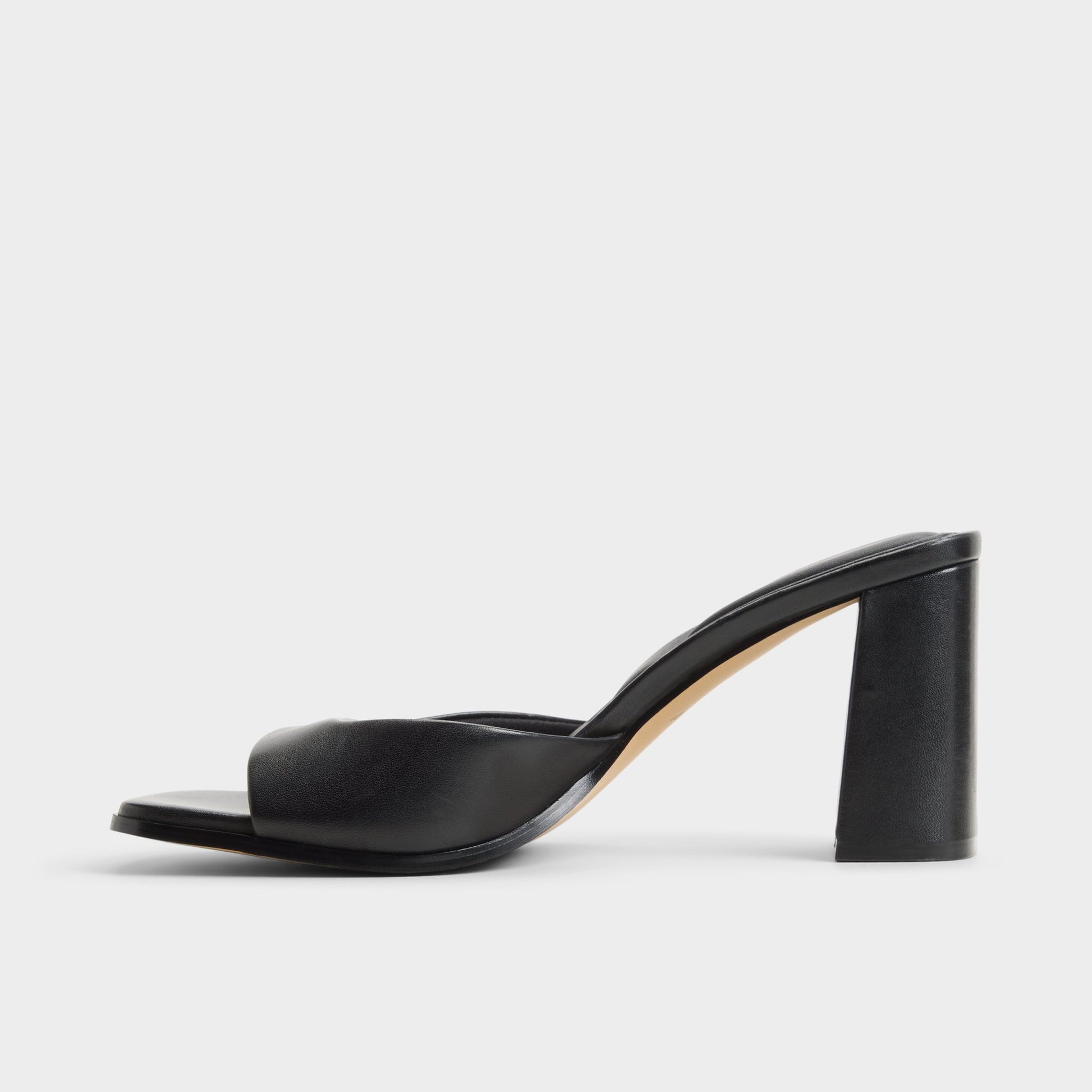 Side view of Black Lisia Heeled mule