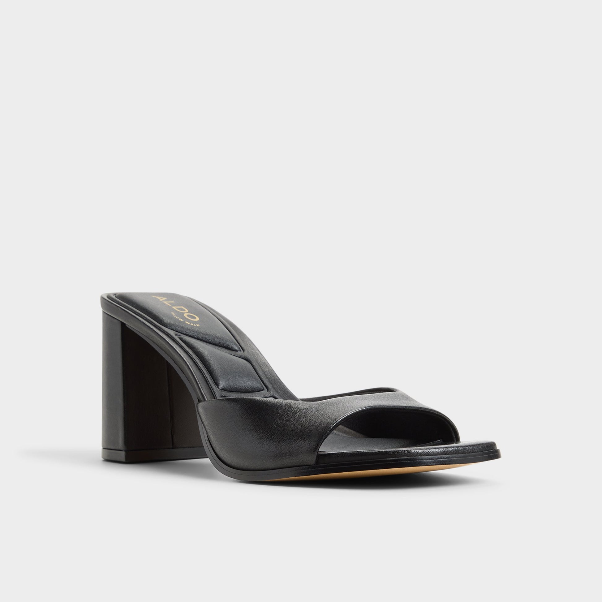 Three-quarter angle of Black Lisia Heeled mule's front side
