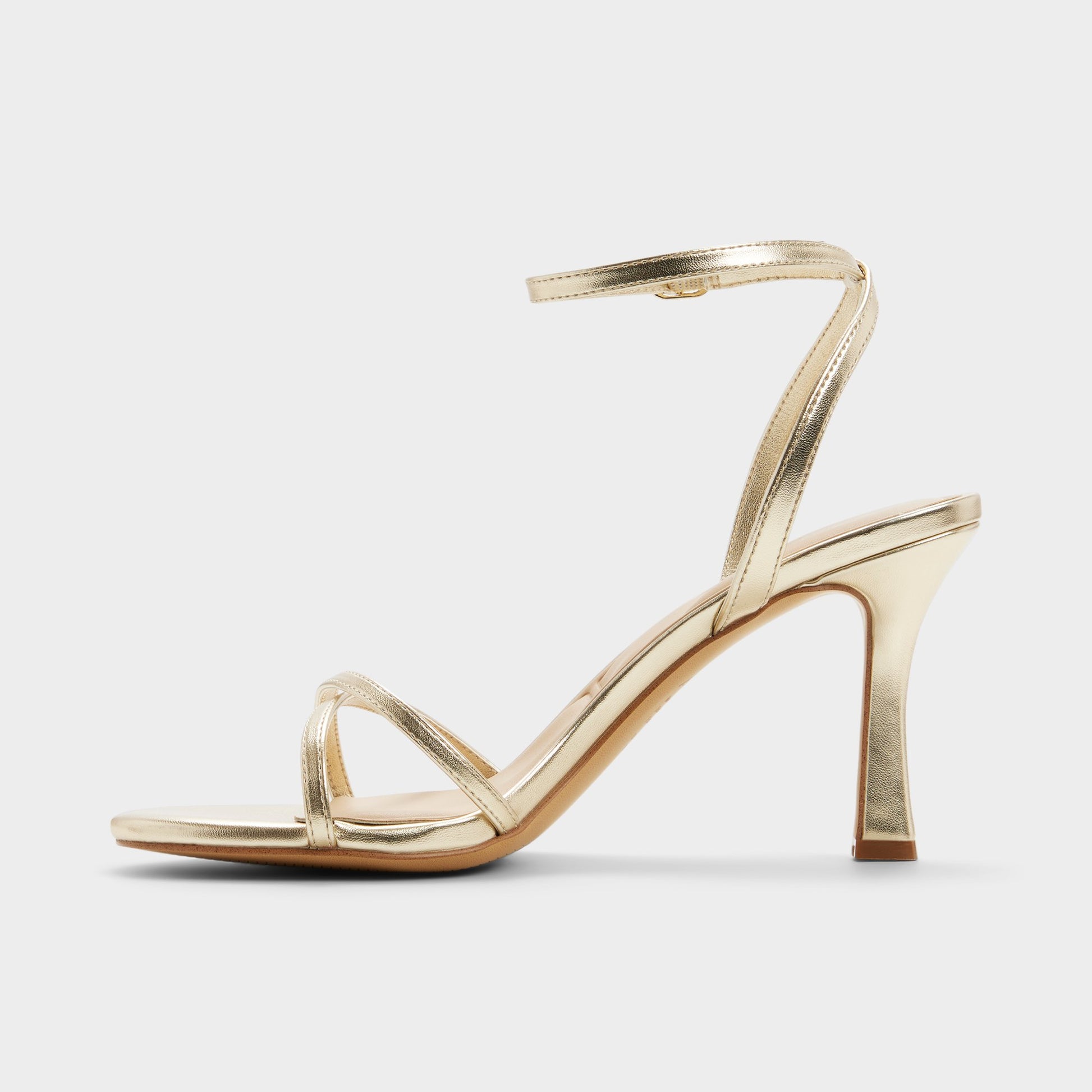 Side view of Champagne Marbela Strappy heeled sandal