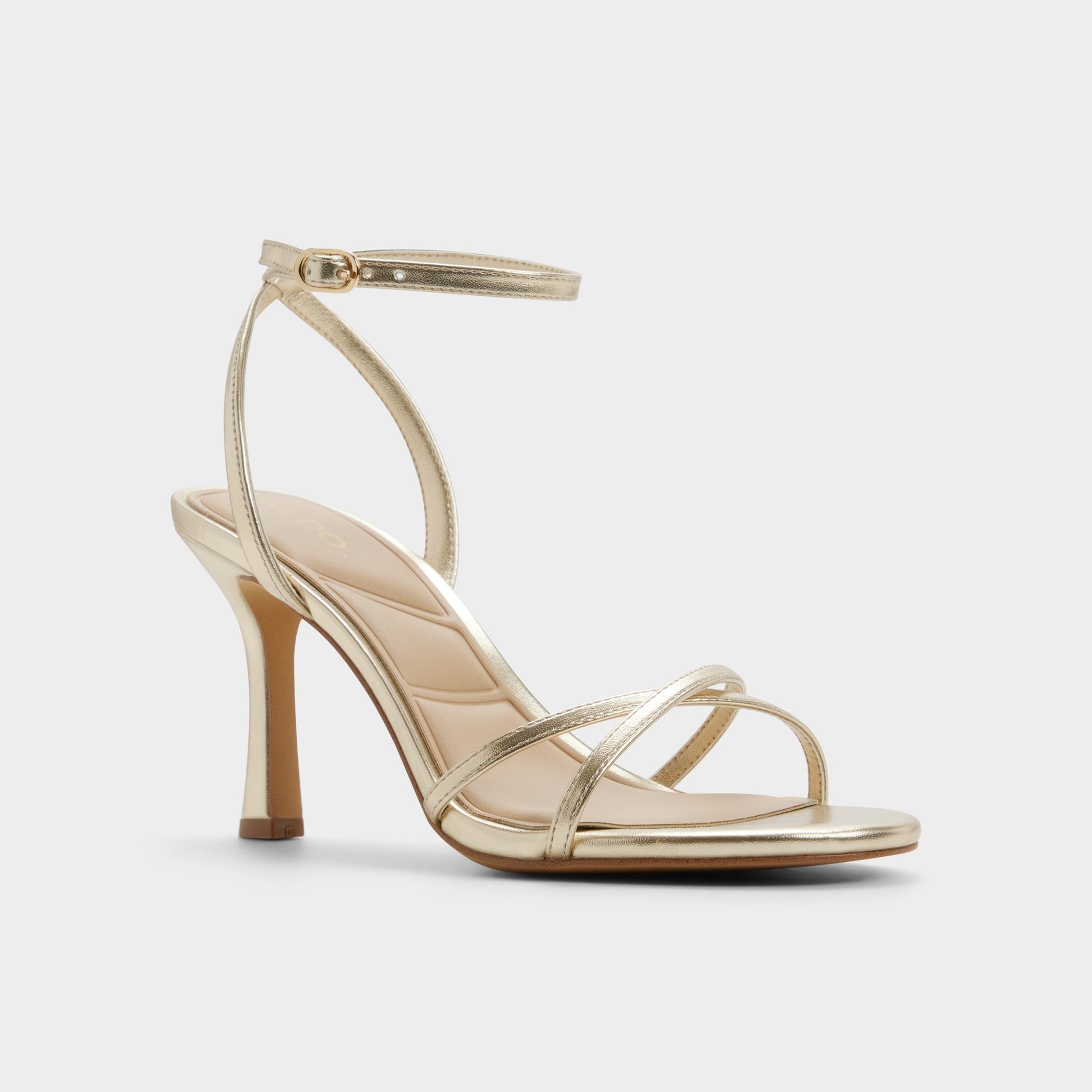 Three-quarter angle of Champagne Marbela Strappy heeled sandal's front side