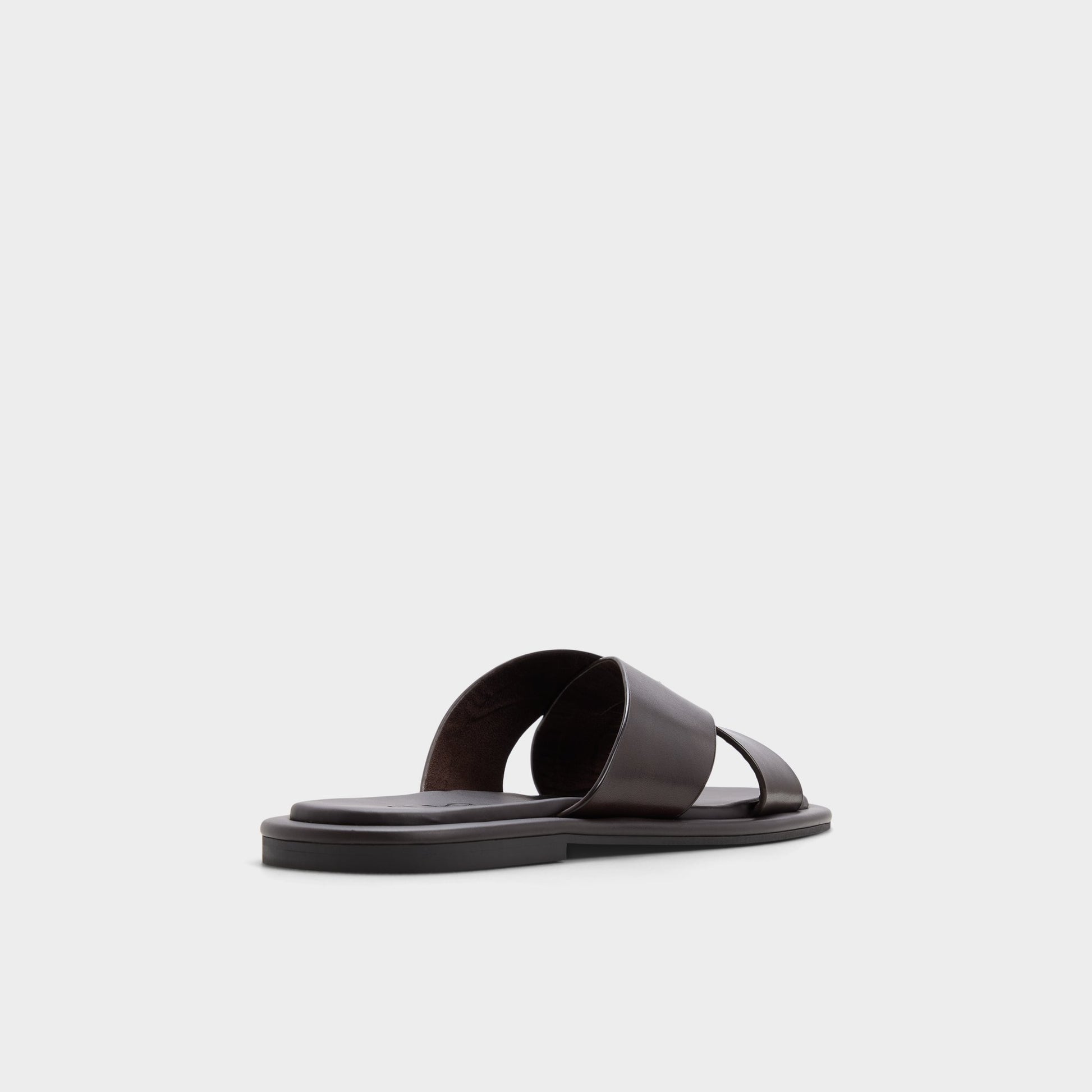Three-quarter angle of Dark brown Emris Slide sandal's back side