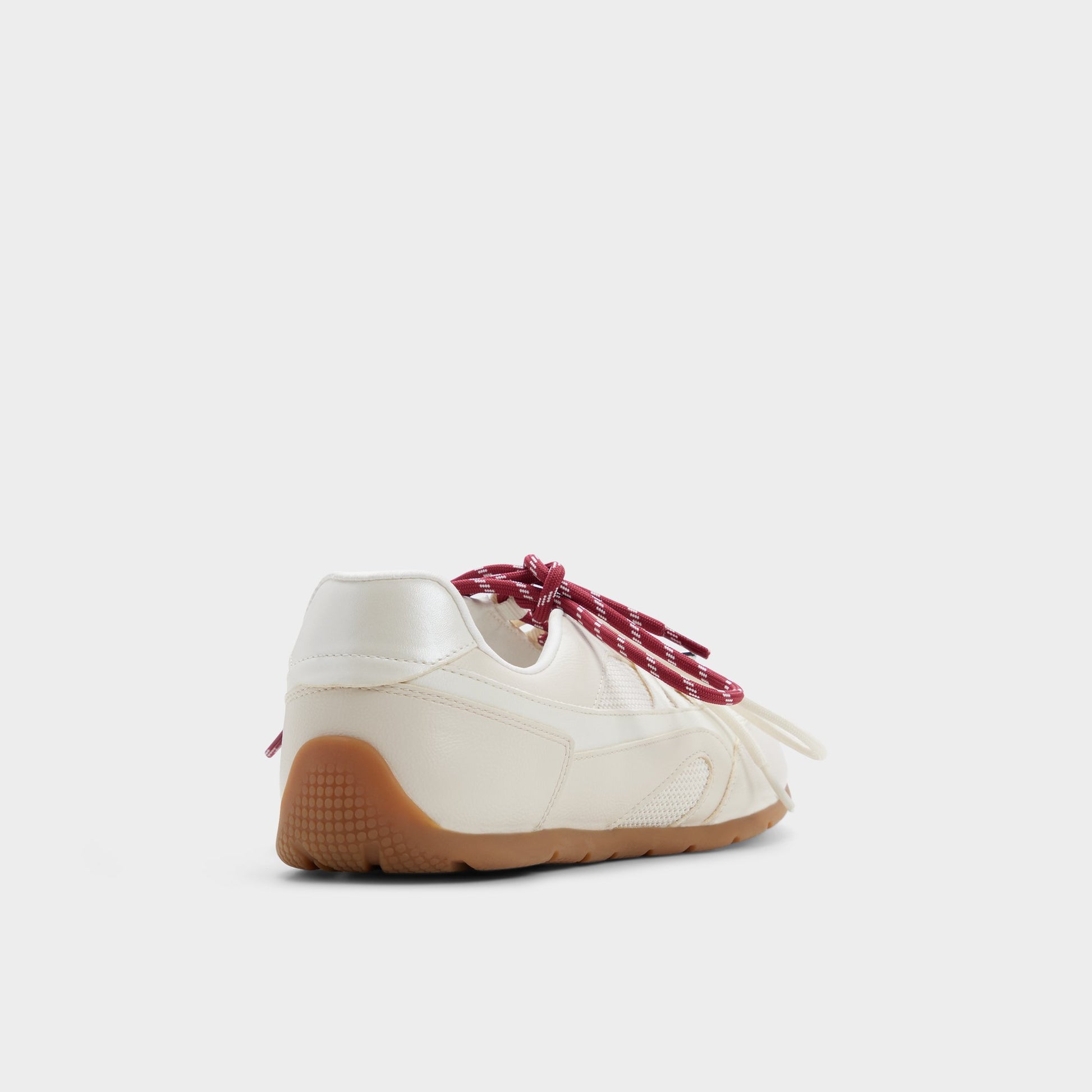 Three-quarter angle of White/bone Prima 's back side