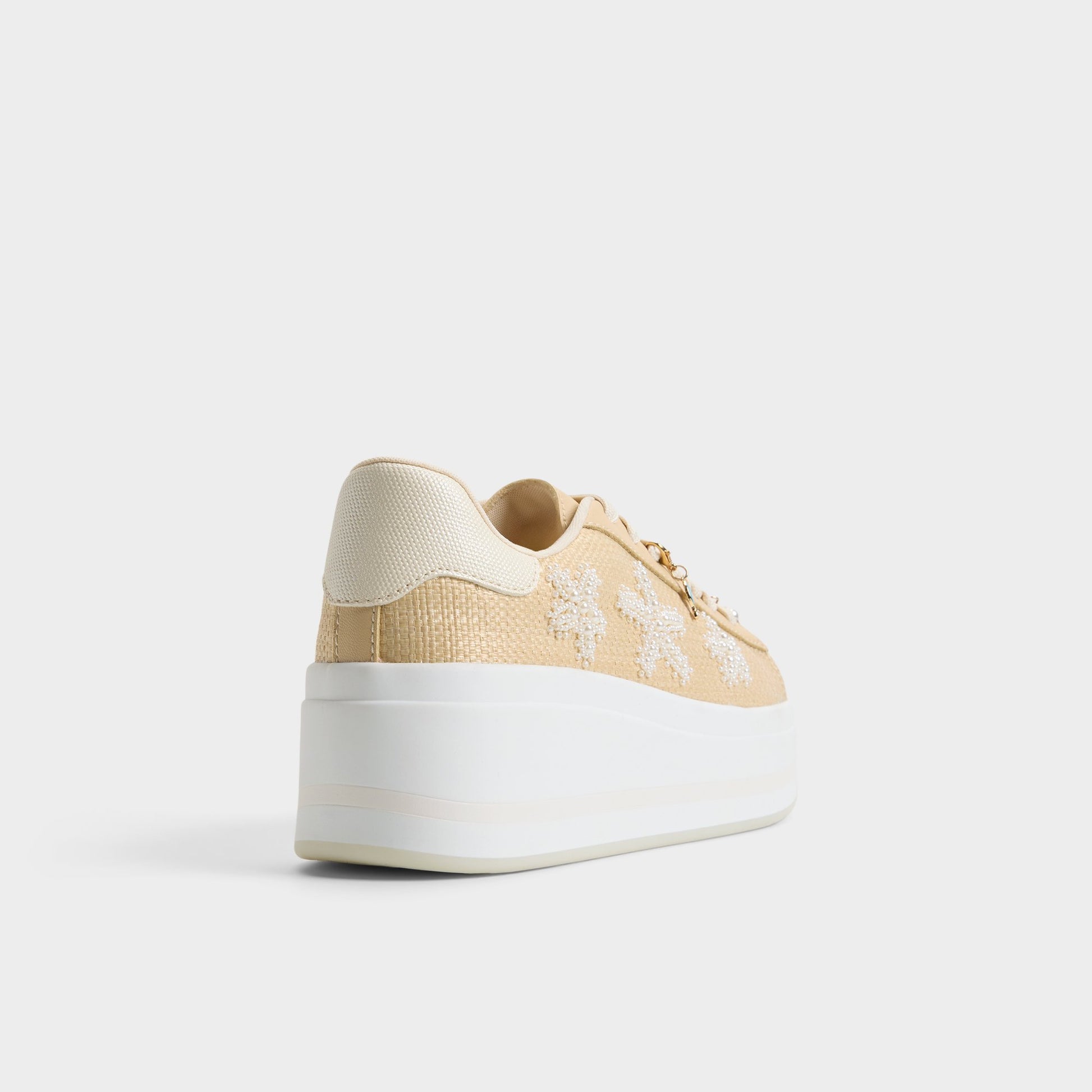 Three-quarter angle of Natural Solair Sneaker's back side