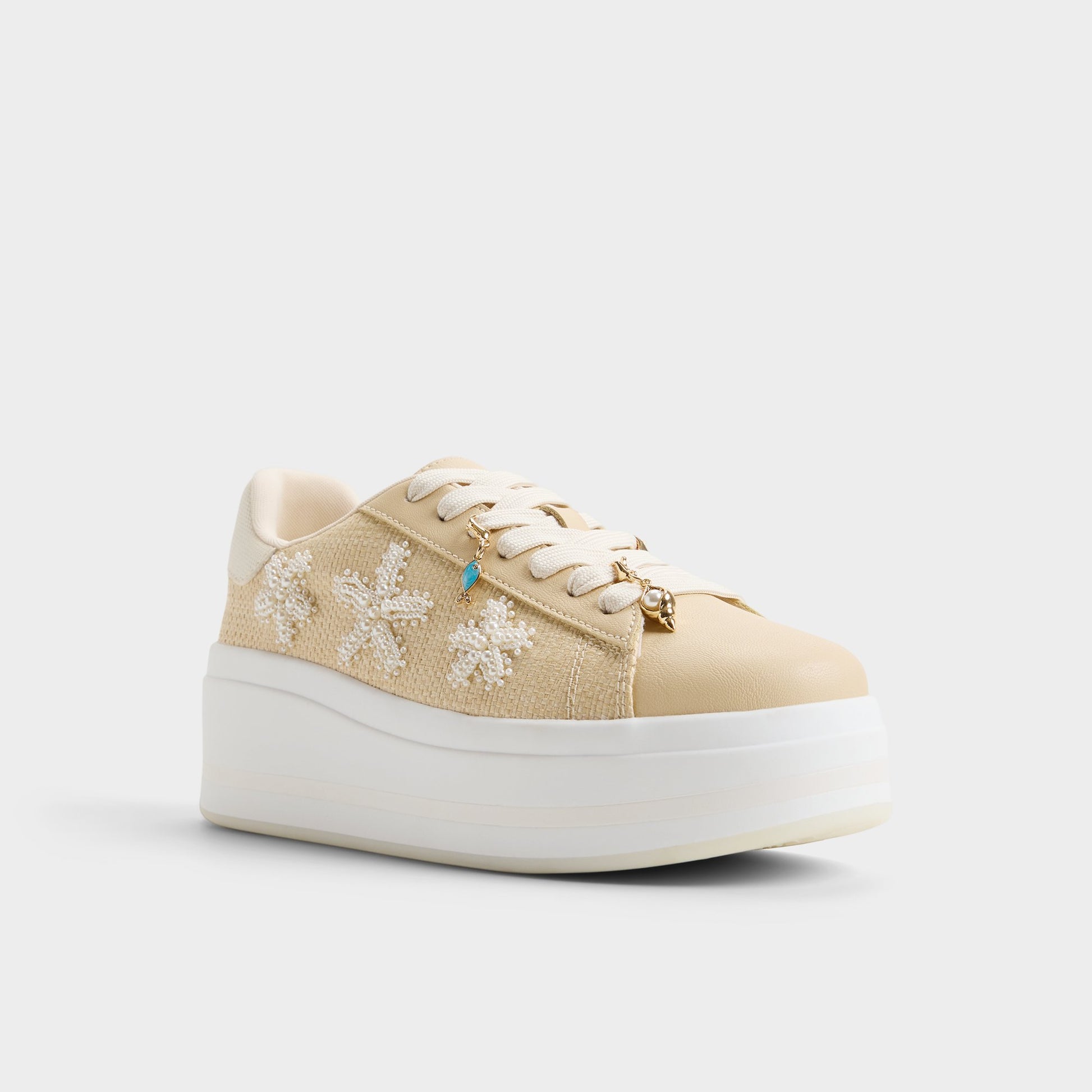 Three-quarter angle of Natural Solair Sneaker's front side