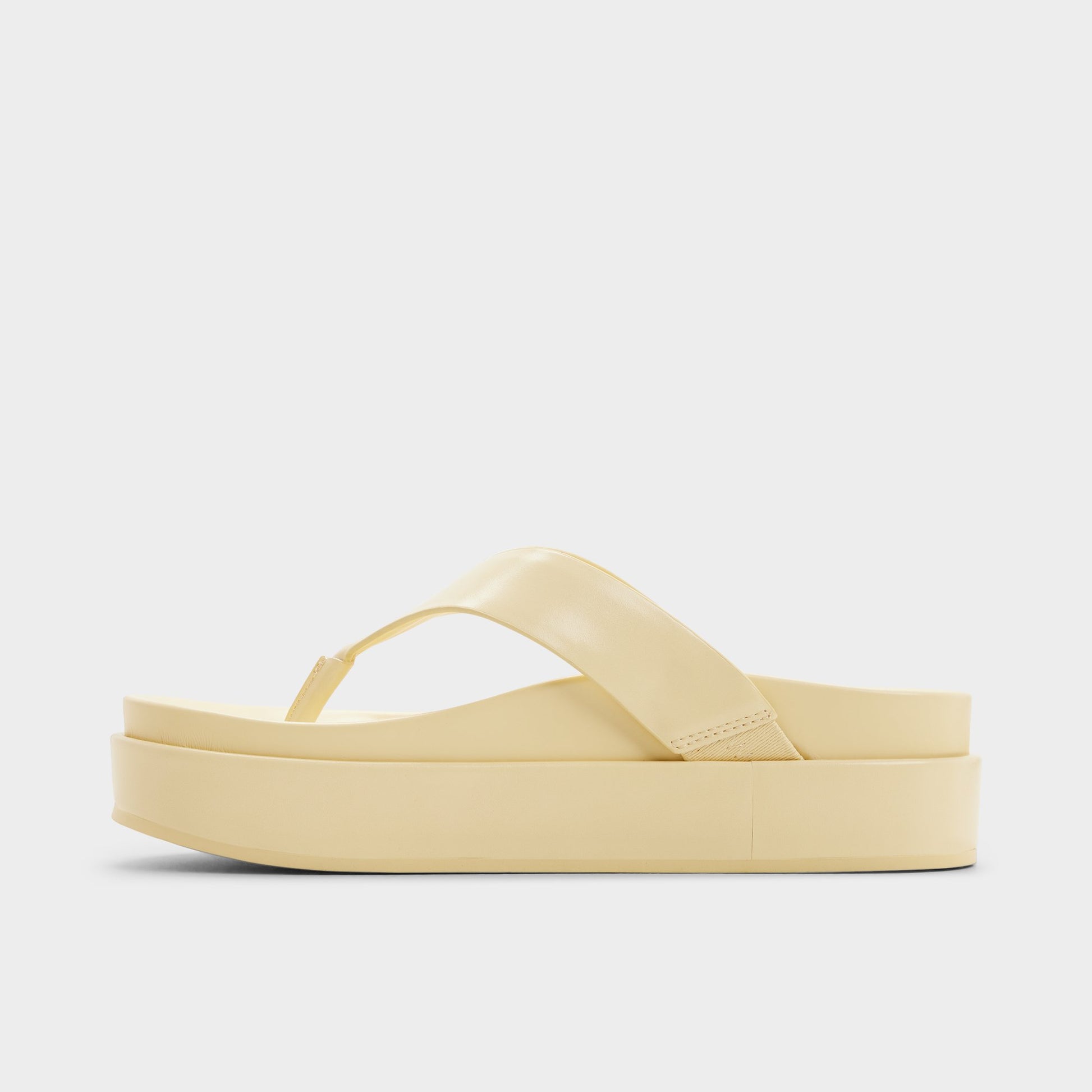 Side view of Light yellow Mist Flip flop