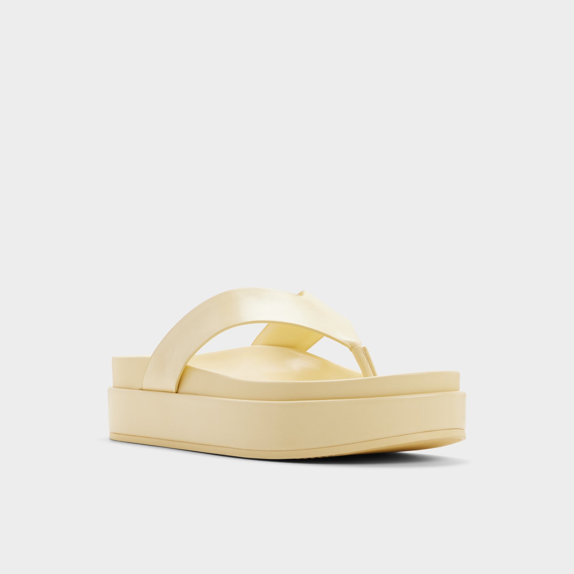 Three-quarter angle of Light yellow Mist Flip flop's front side