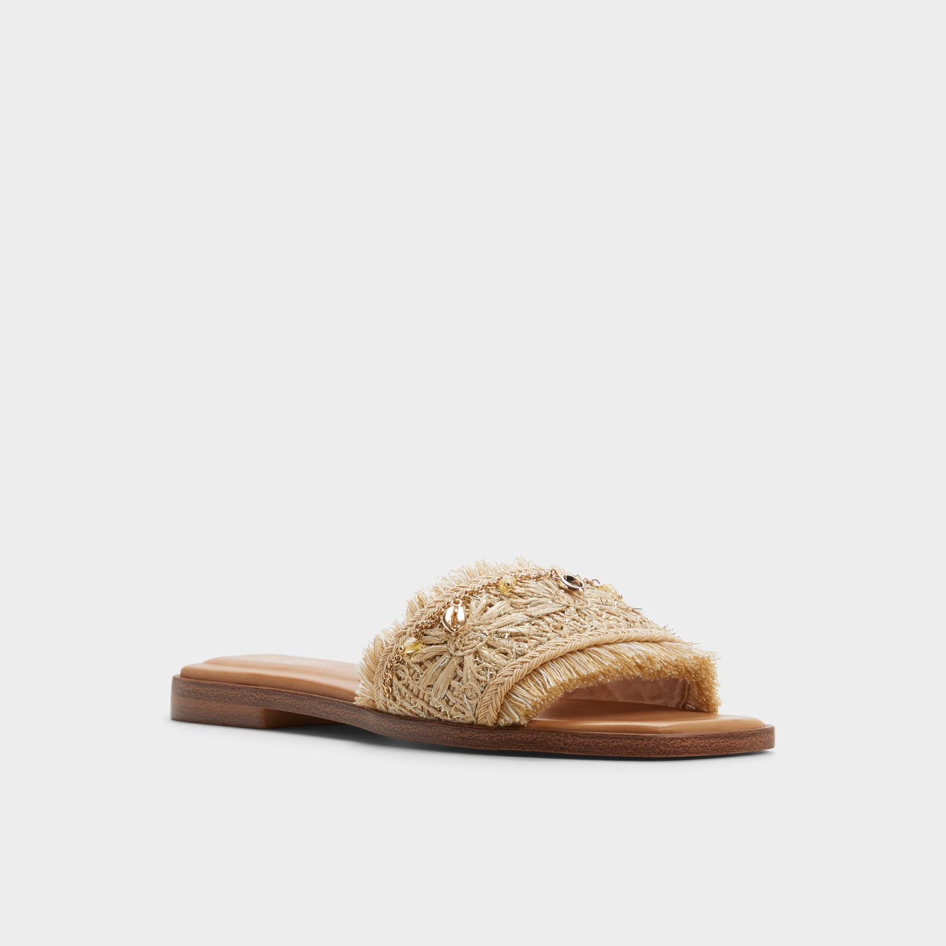 Three-quarter angle of Natural Aurana Slide sandal's front side
