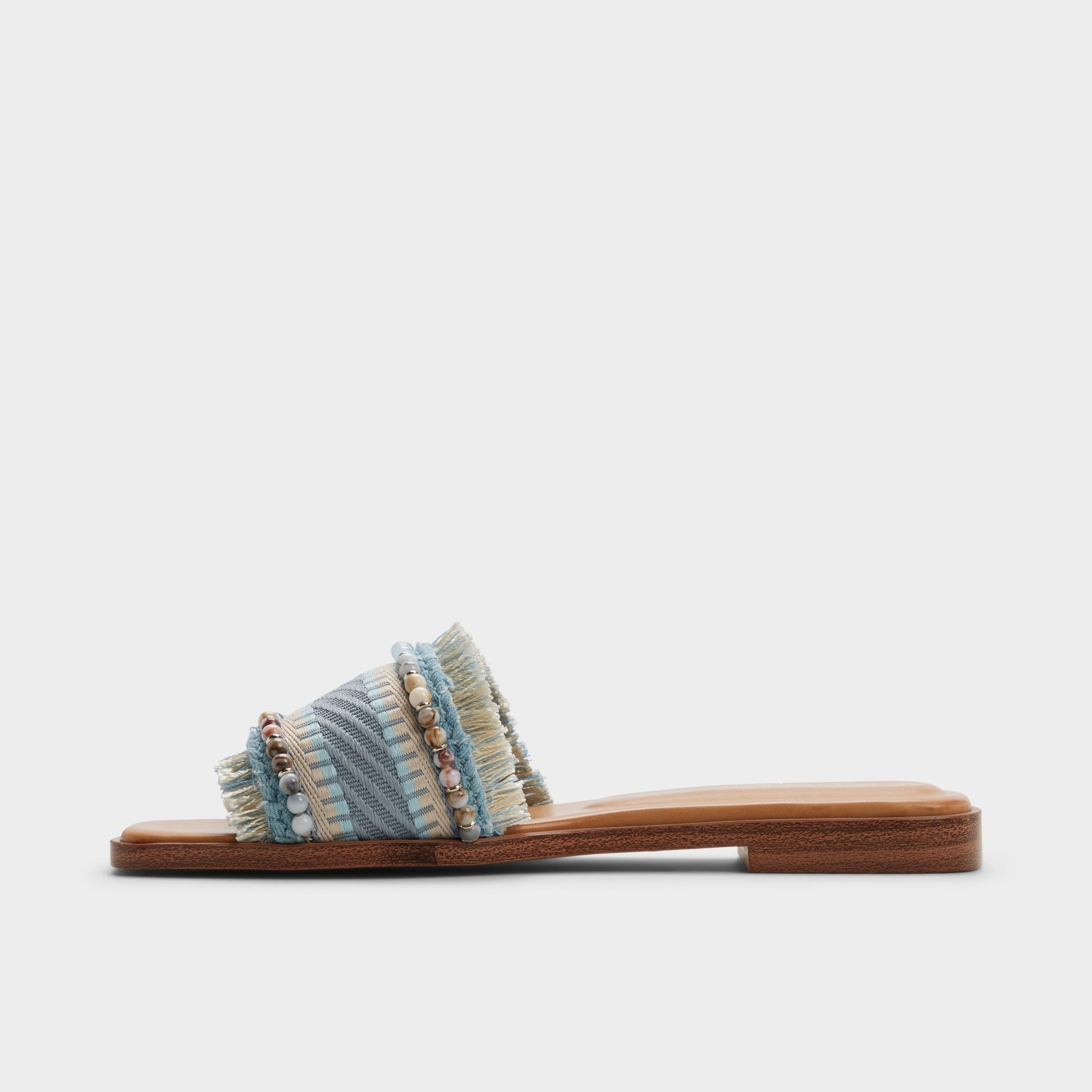 Side view of Other blue Aurana Slide sandal