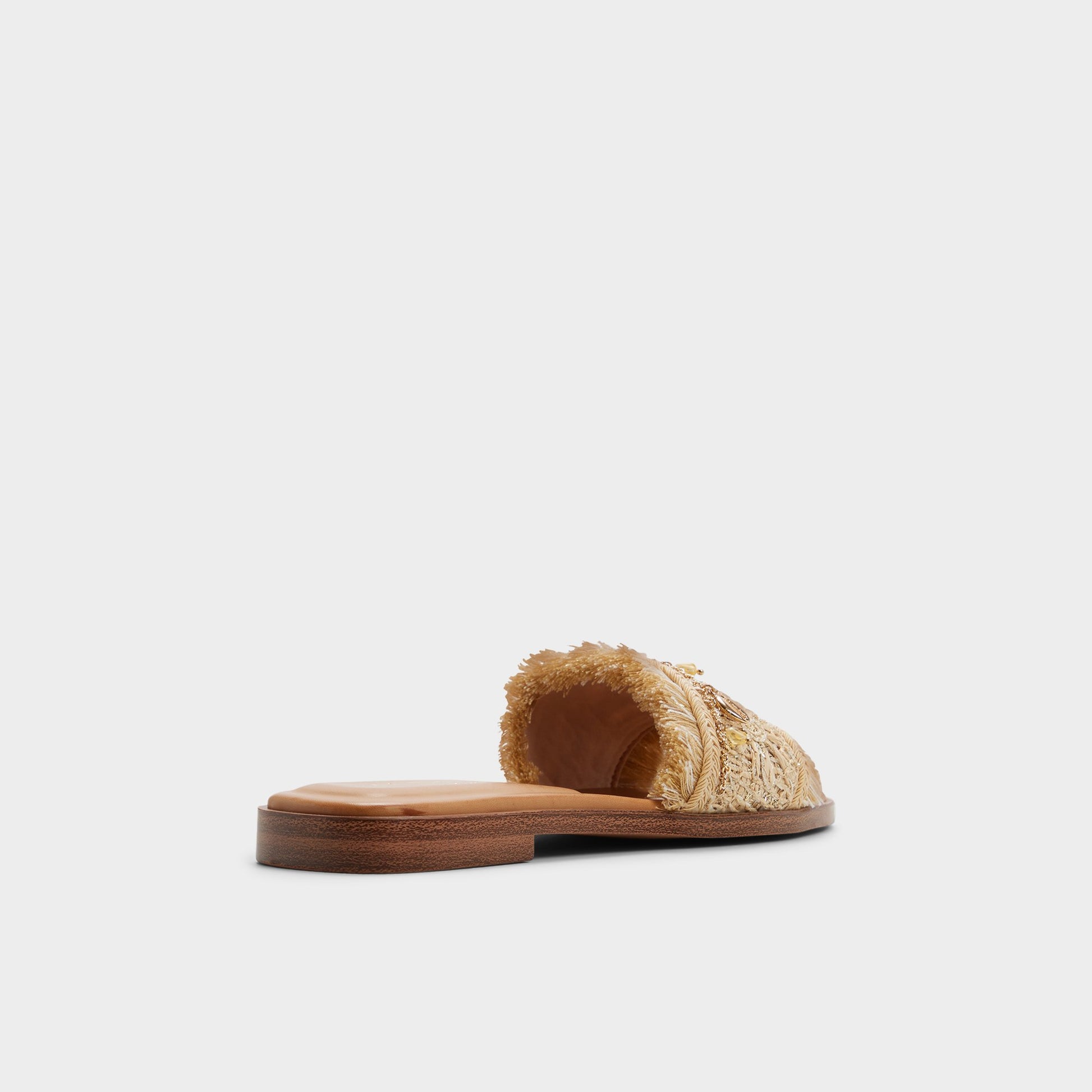 Three-quarter angle of Natural Aurana Slide sandal's back side