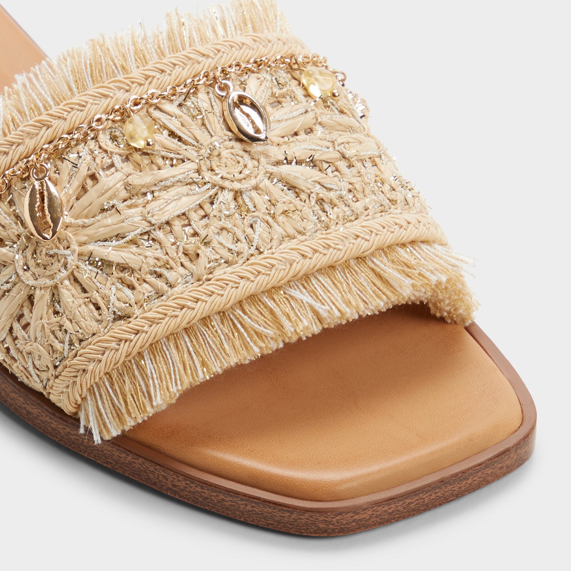 Close-up of the Natural Aurana Slide sandal