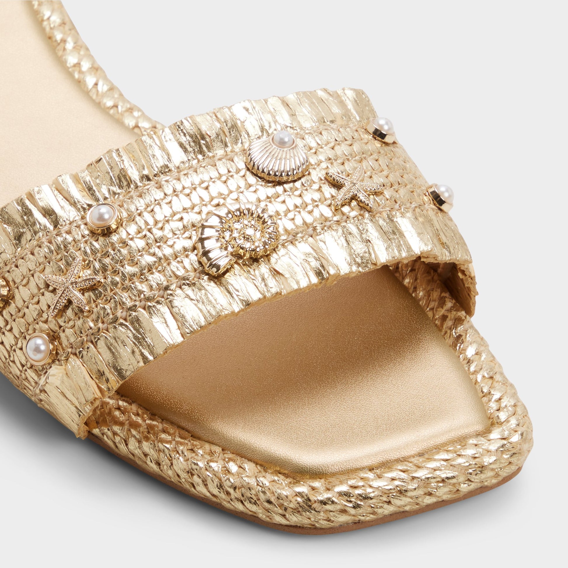 Close-up of the Gold Aurania Slide sandal