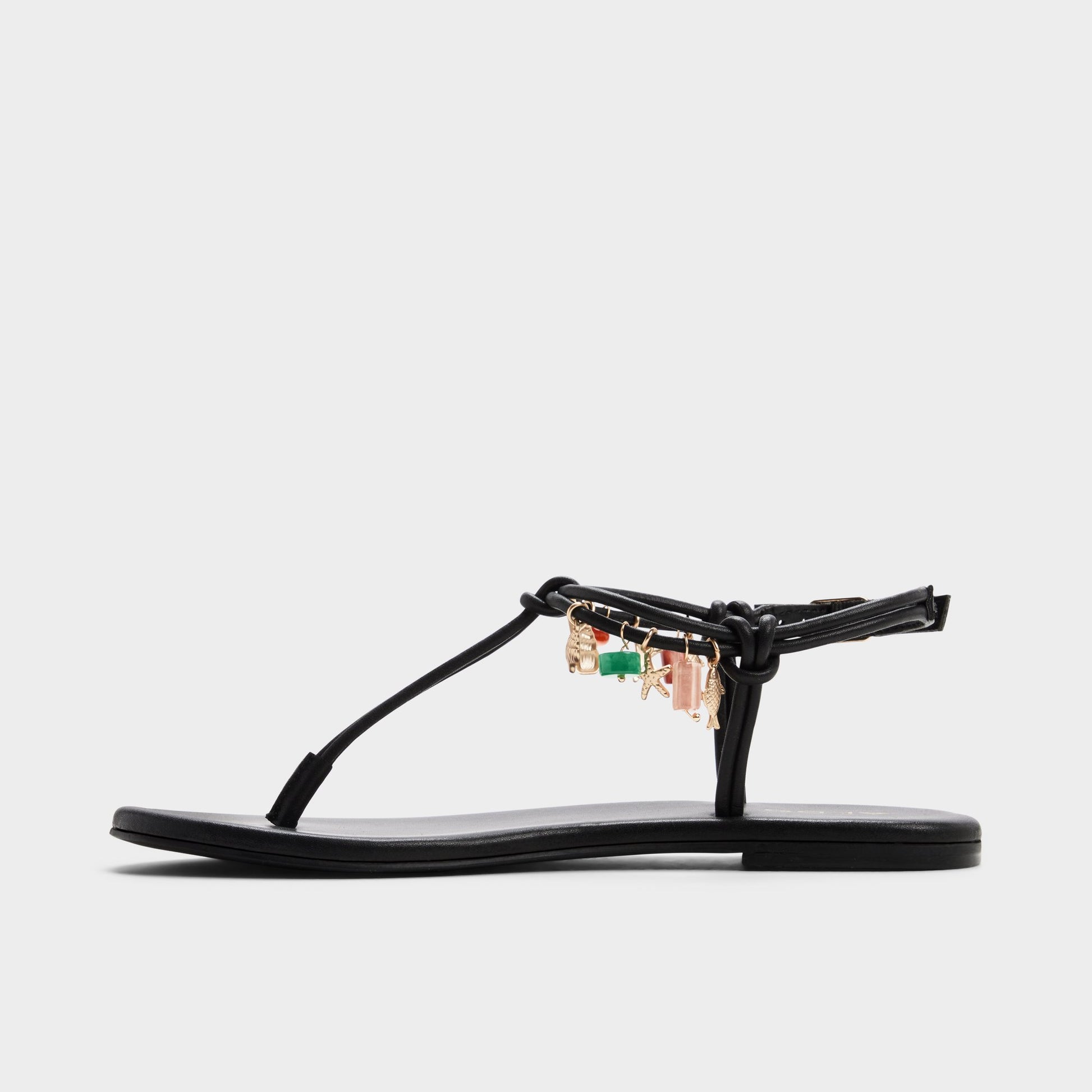 Side view of Black Seajewels T-strap sandal