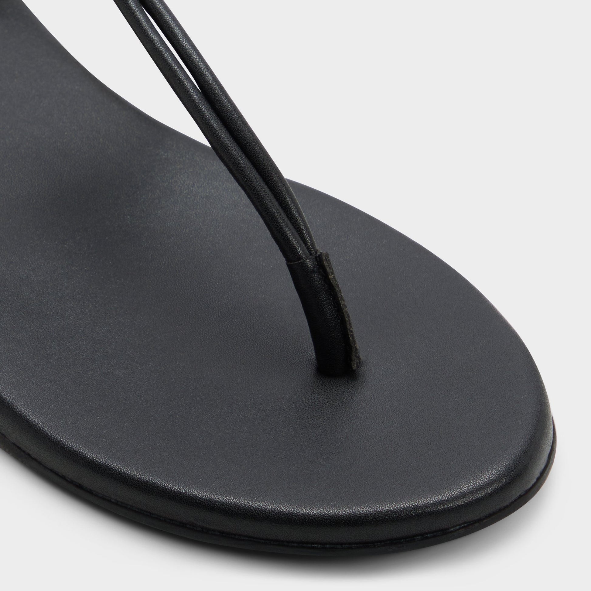 Close-up of the Black Seajewels T-strap sandal