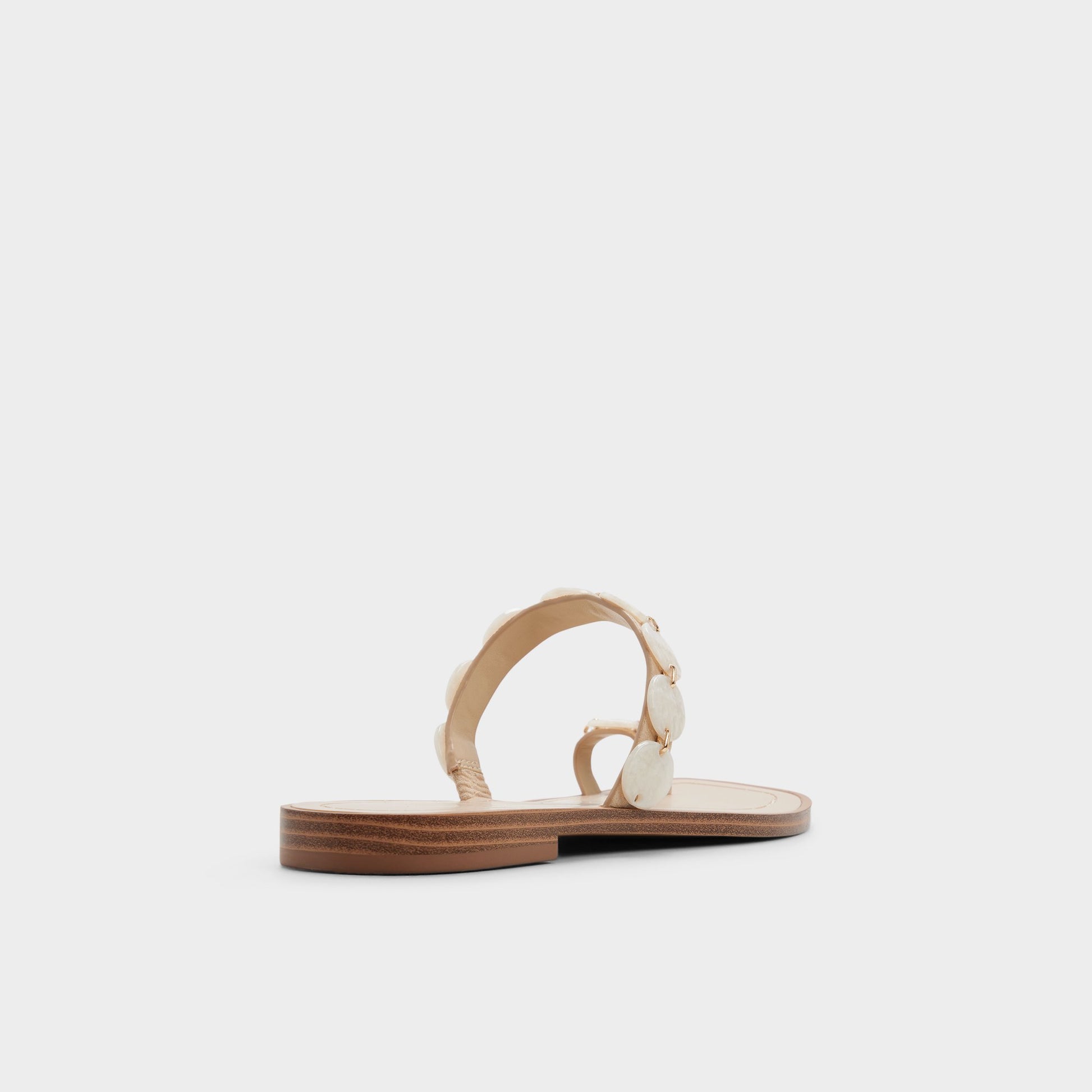 Three-quarter angle of Sand Crystiana Slide sandal's back side