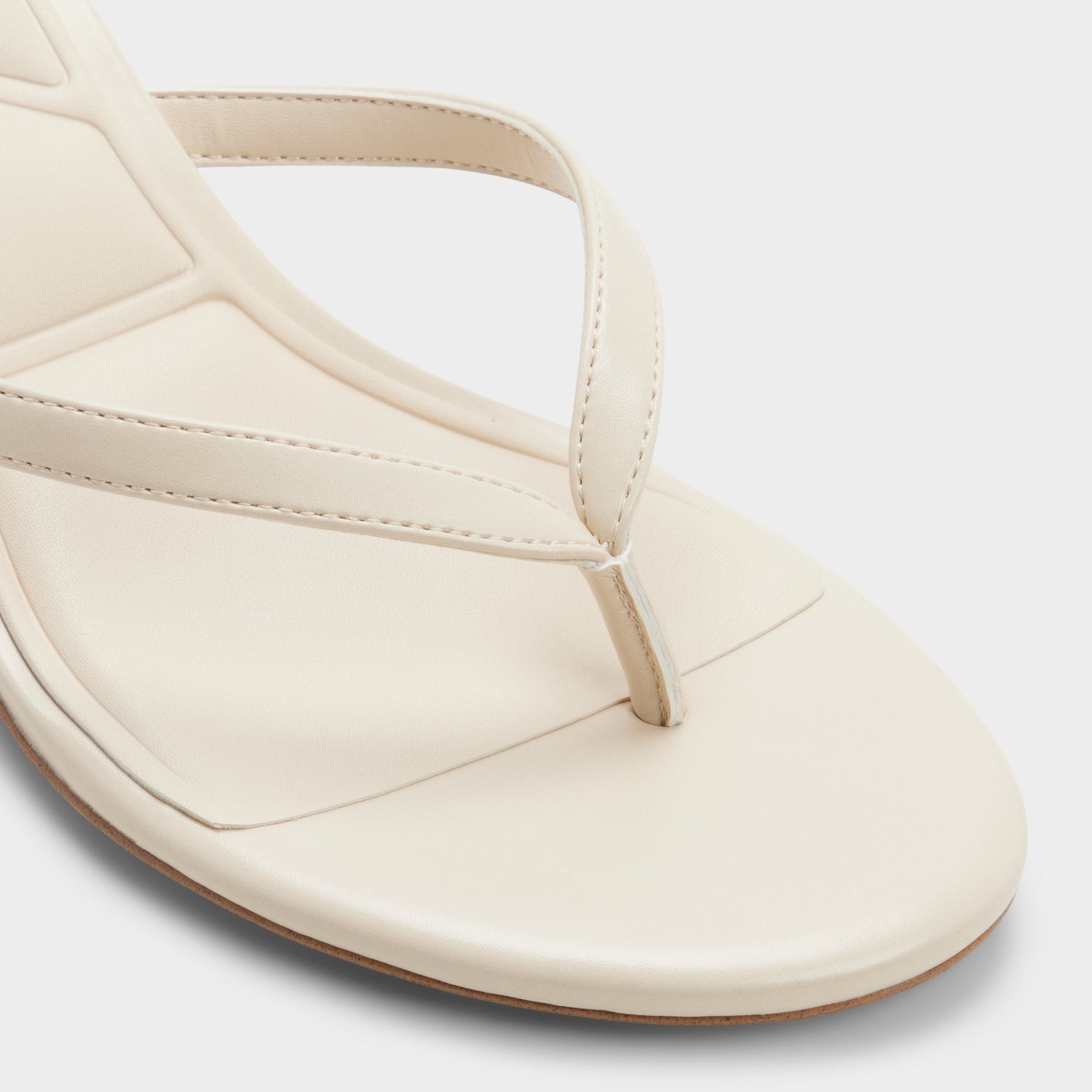 Close-up of the Cream Lift Heeled flip flop