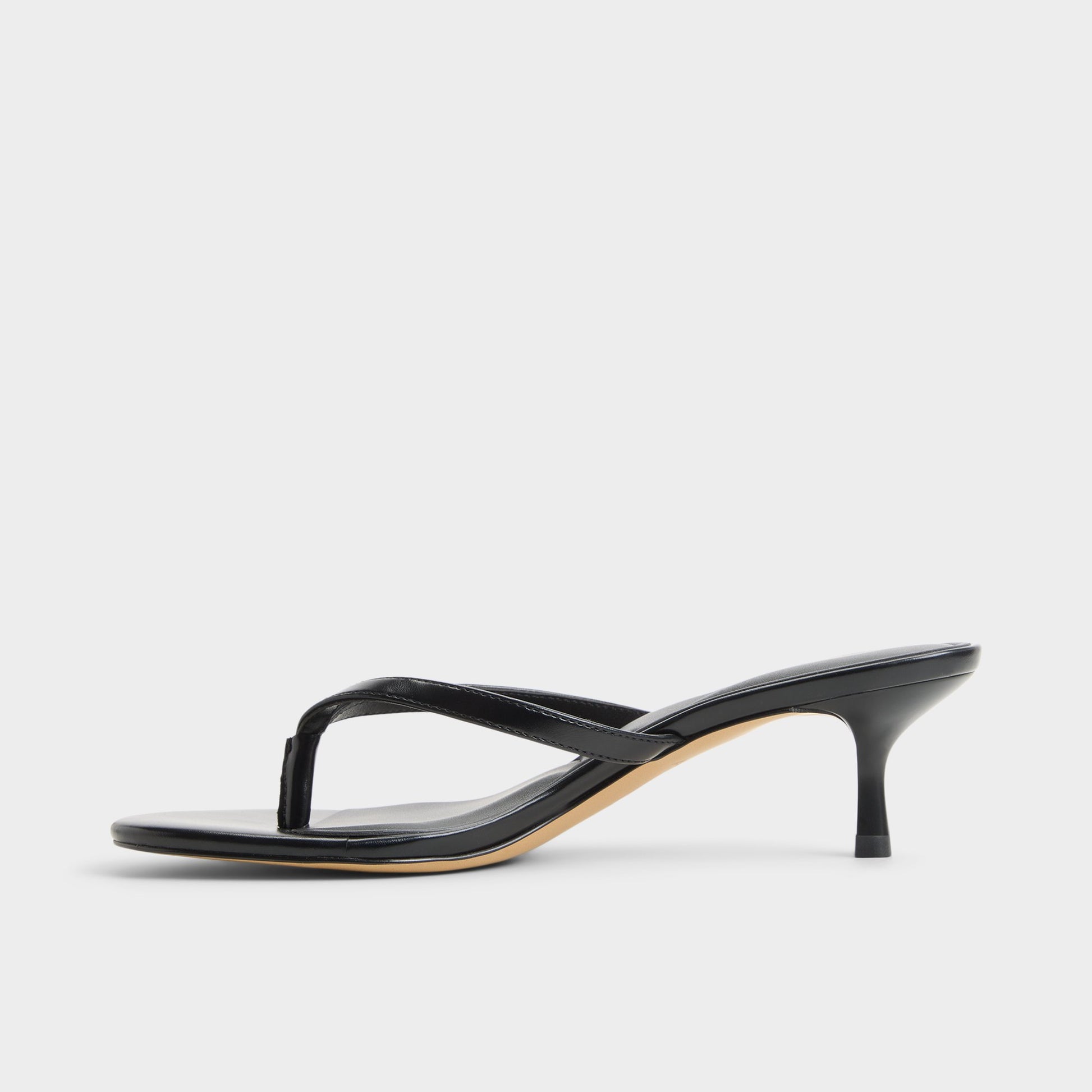 Side view of Black Lift Heeled flip flop