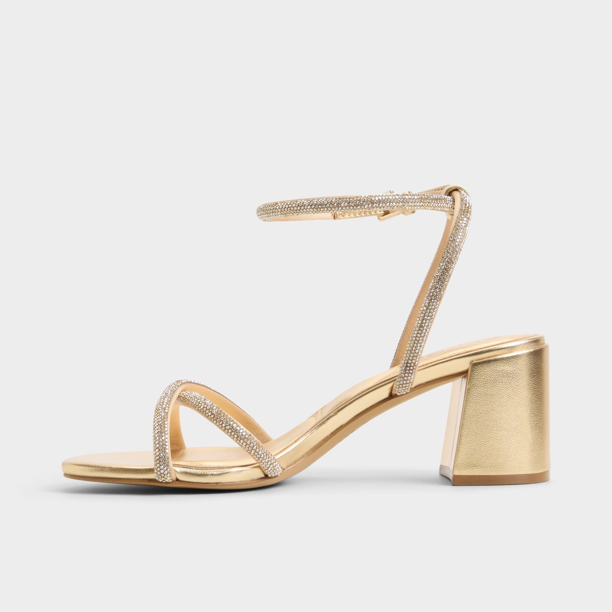 Side view of Gold Boucliette Strappy heeled sandal