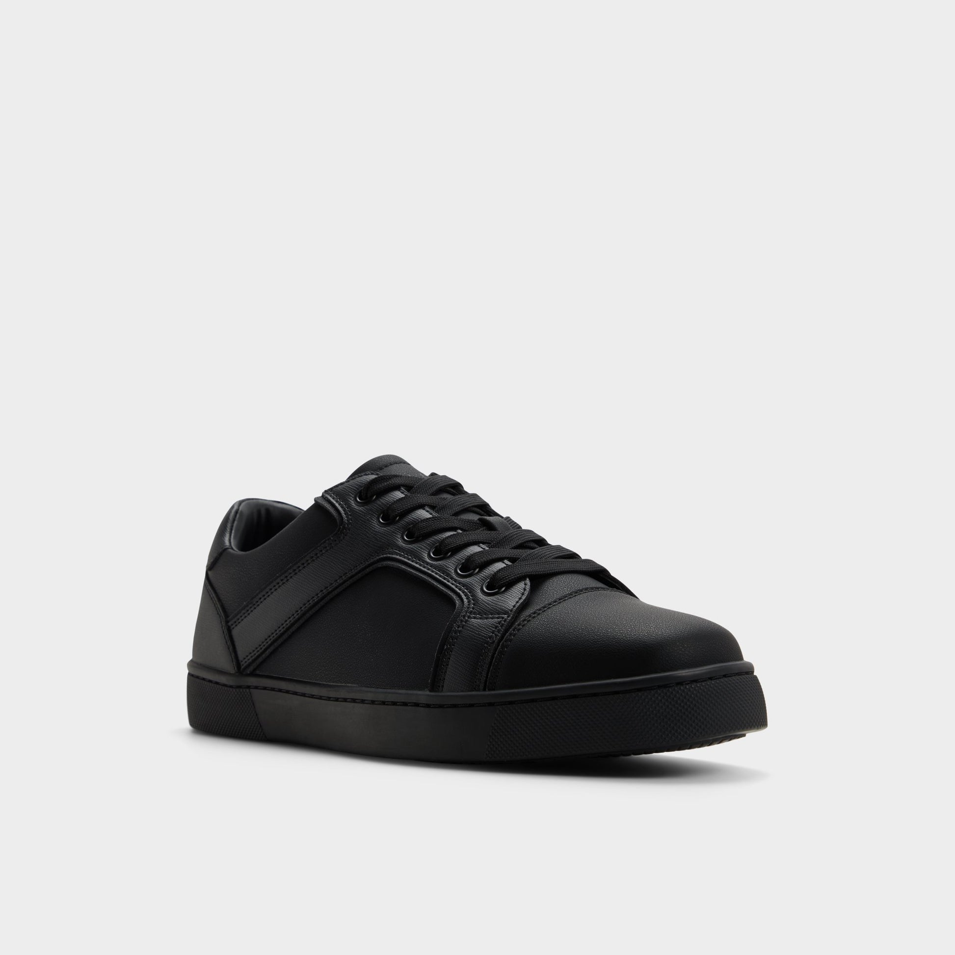 Three-quarter angle of Black/black Suitsneaker Low top sneaker's front side