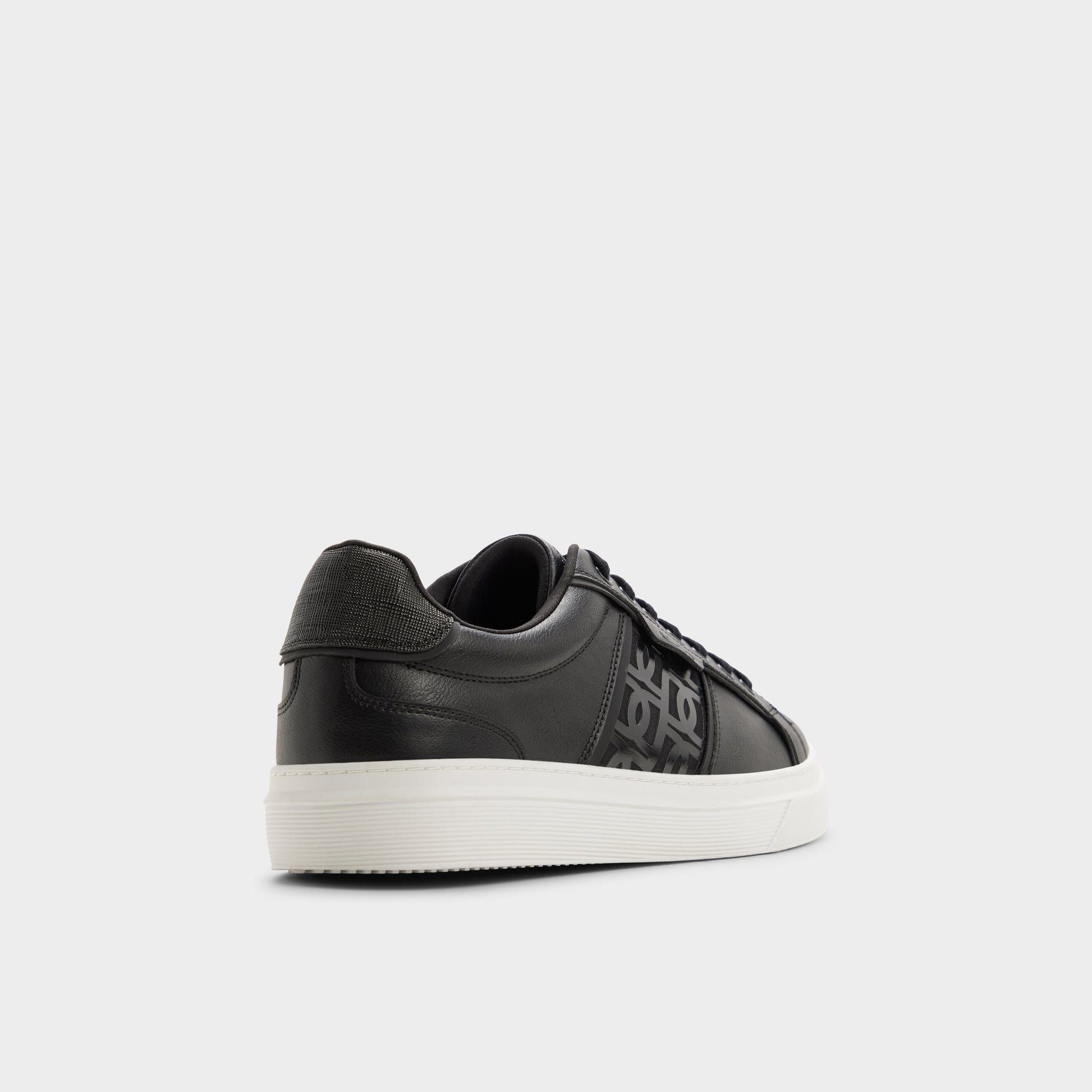 Three-quarter angle of Black combo Courtline Low top sneaker's back side