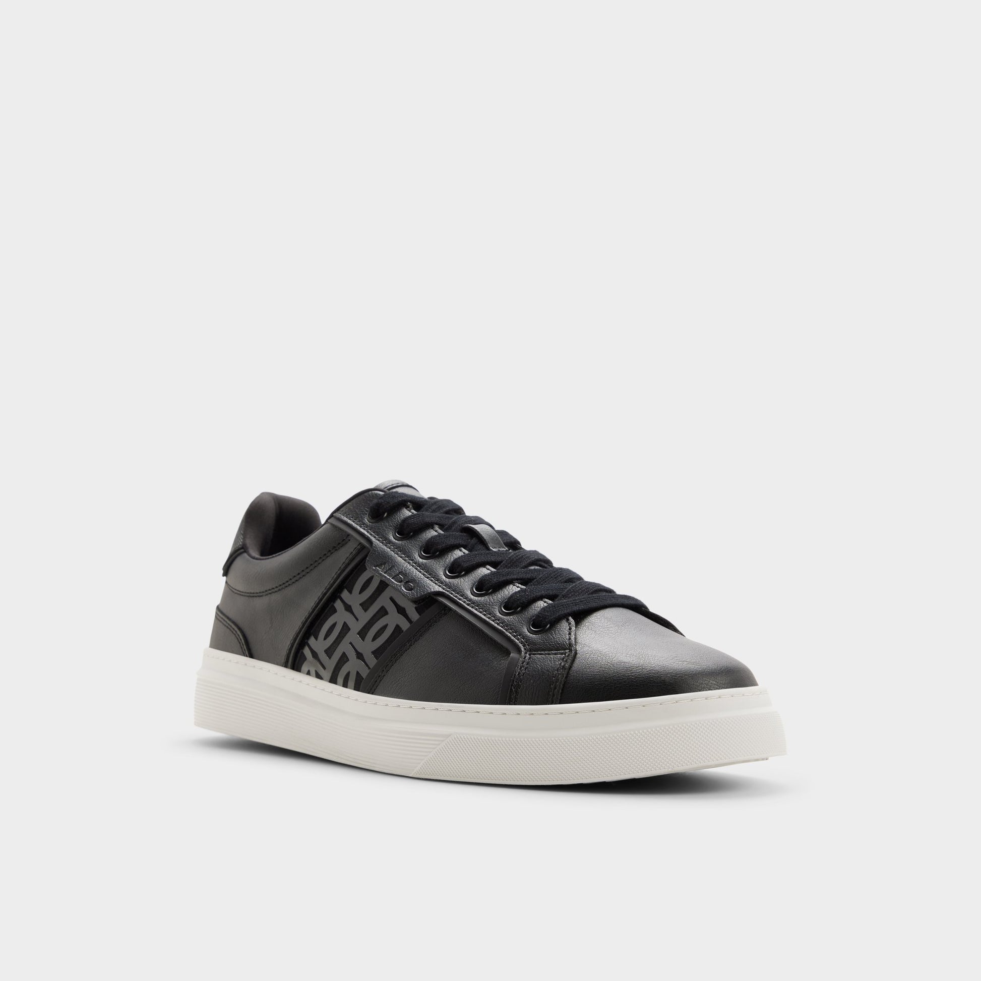 Three-quarter angle of Black combo Courtline Low top sneaker's front side