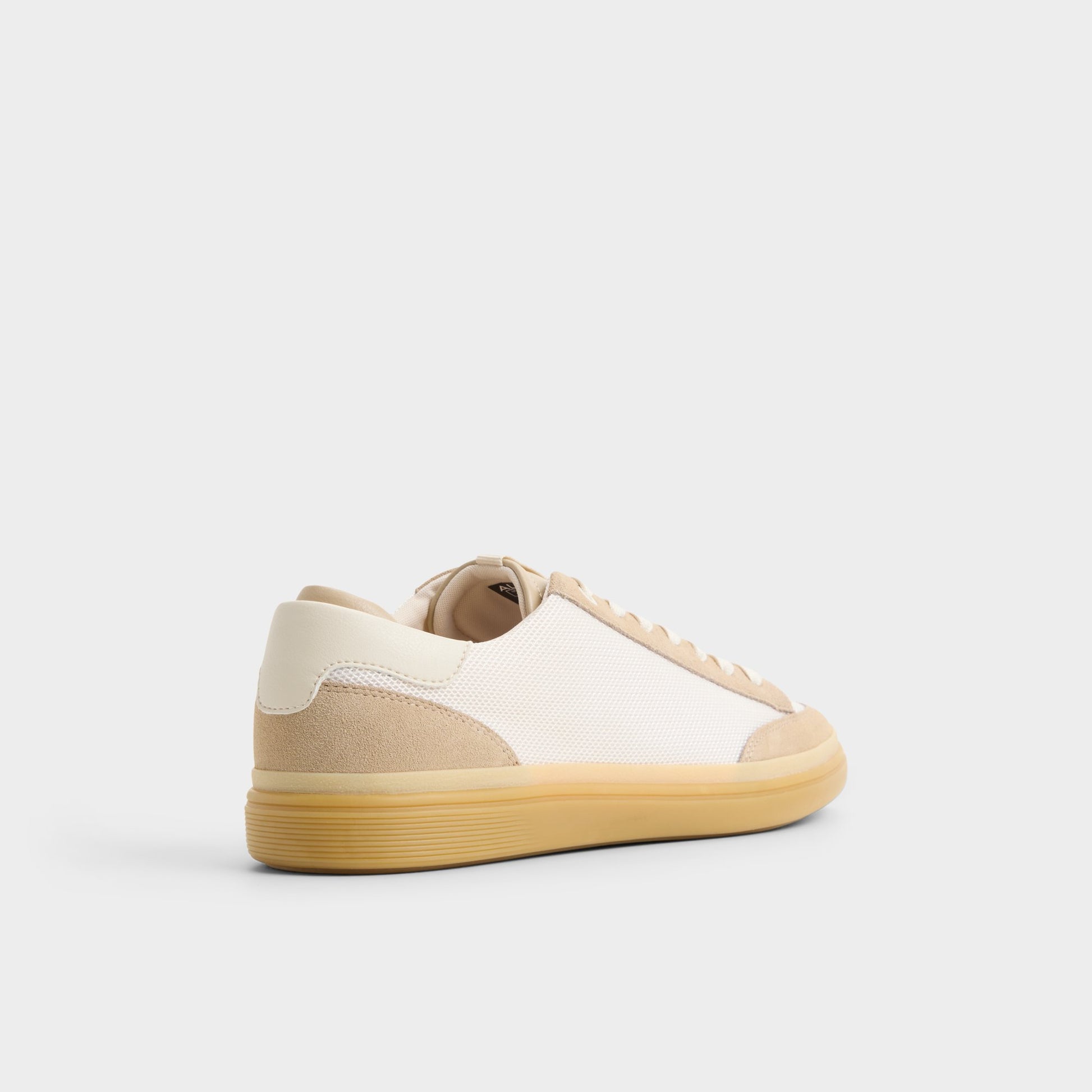 Three-quarter angle of Ivory Stepup Low top sneaker's back side