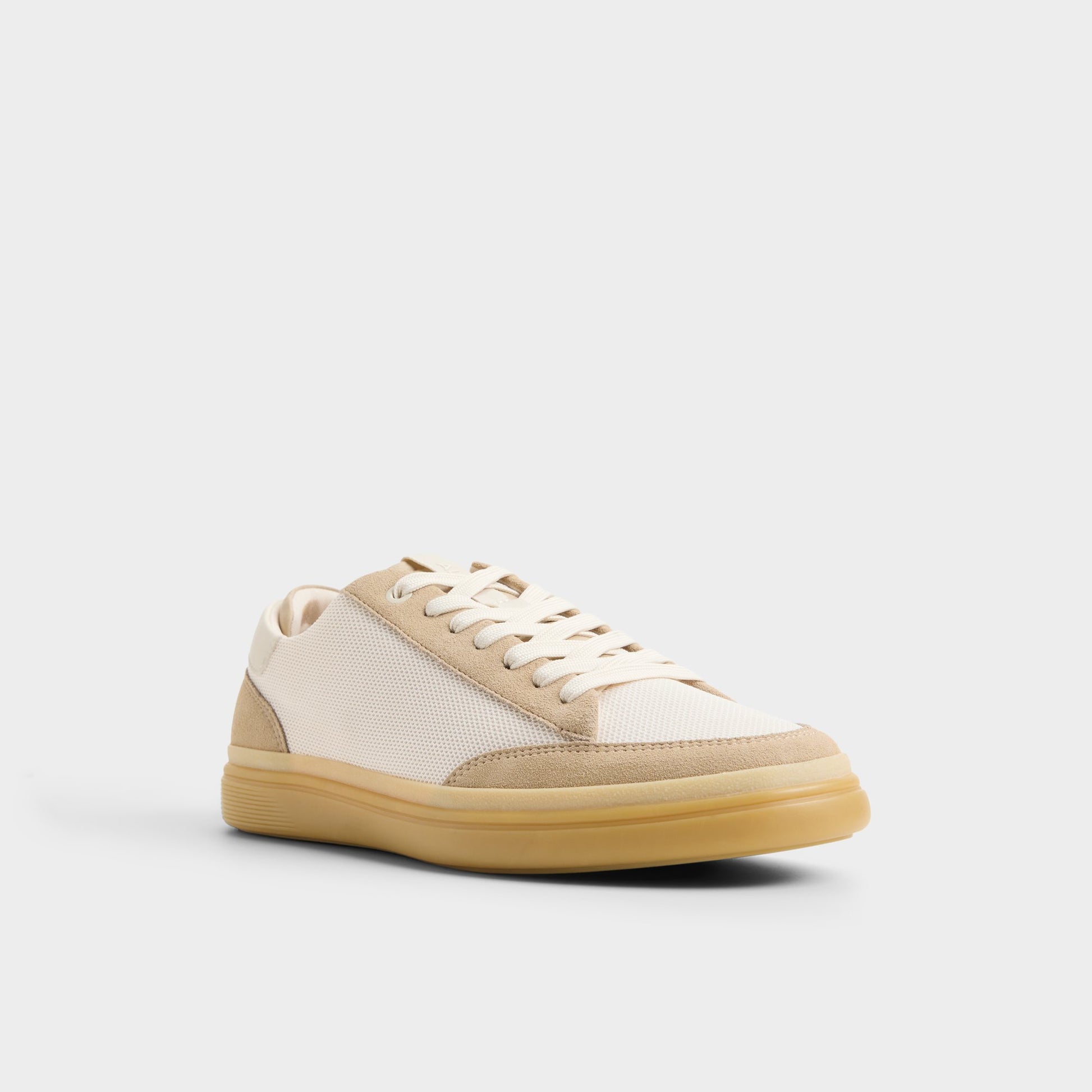 Three-quarter angle of Ivory Stepup Low top sneaker's front side