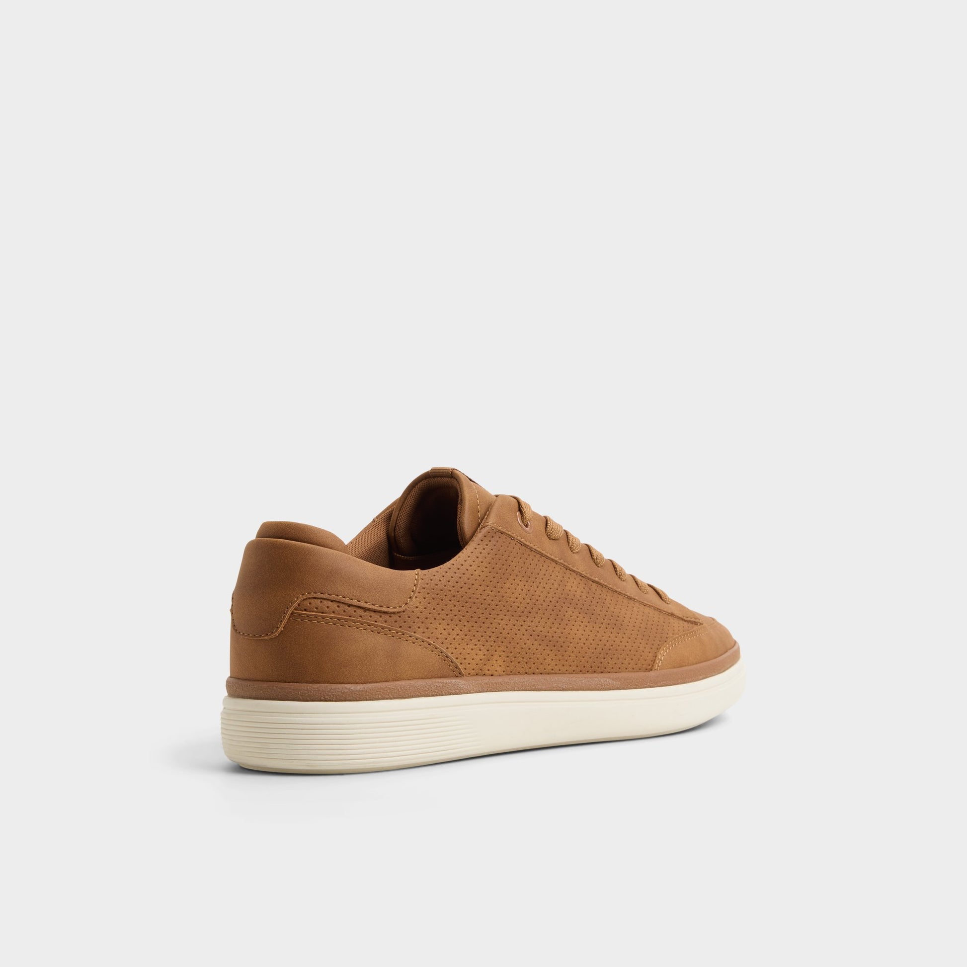 Three-quarter angle of Brown Stepup Low top sneaker's back side