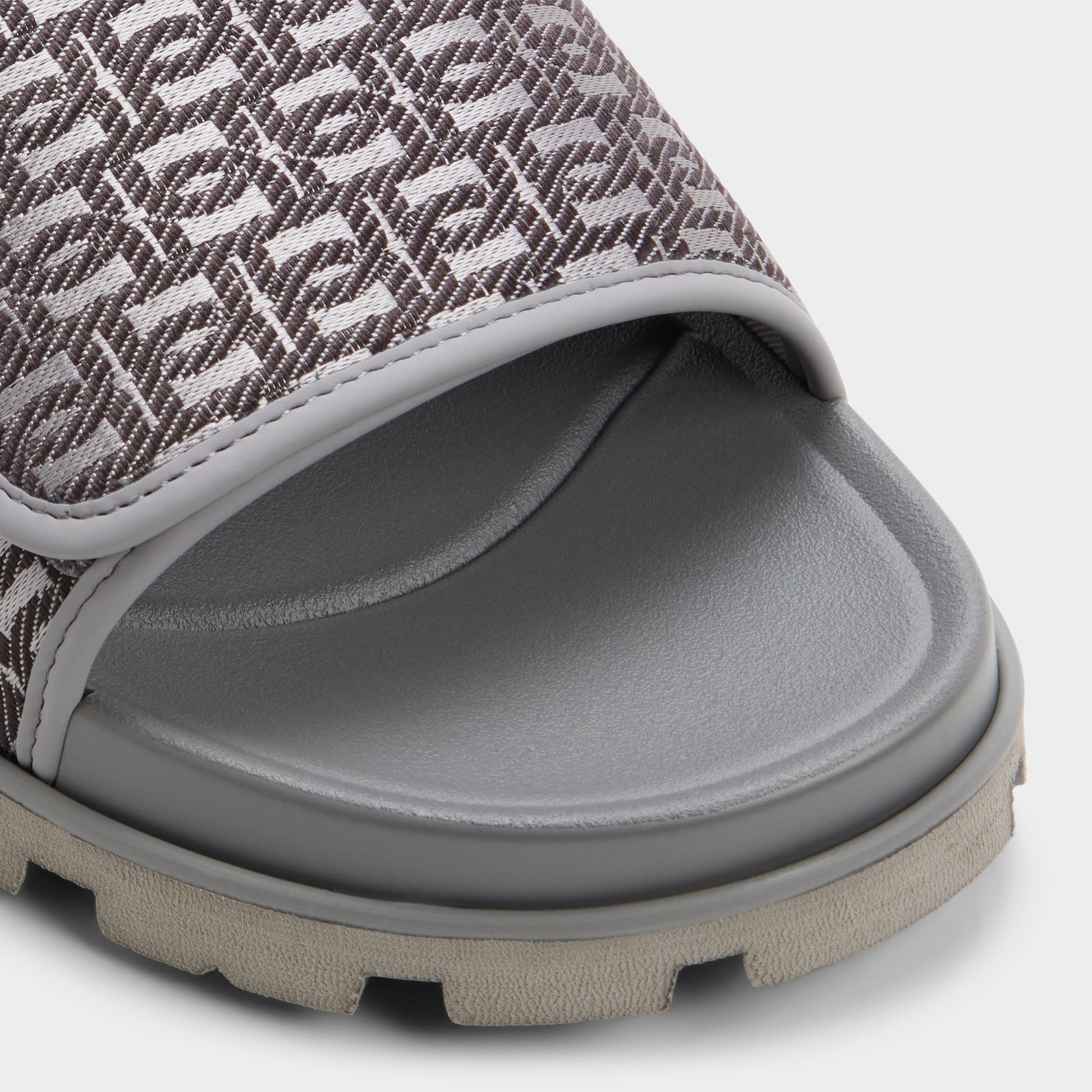 Close-up of the Light grey Orian Slide sandal