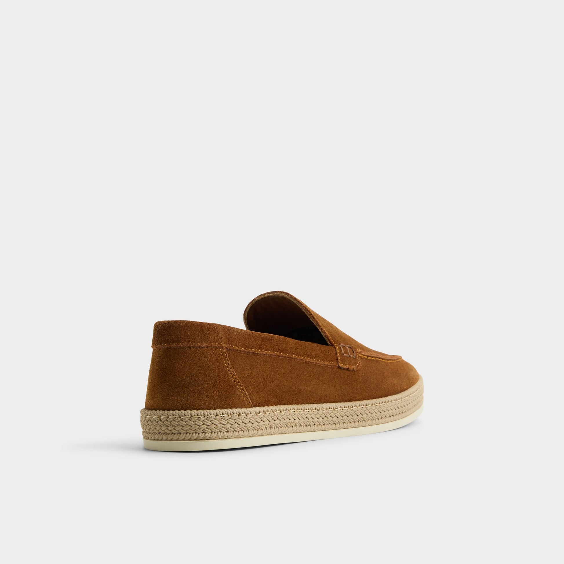 Three-quarter angle of Cognac Cliffe Slip-on's back side