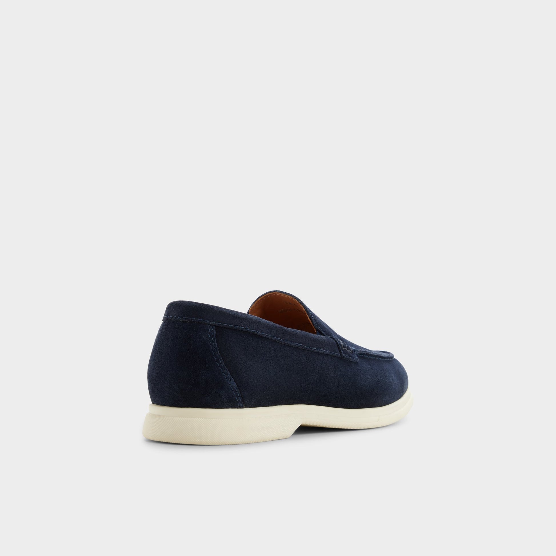 Three-quarter angle of Navy Dolan Slip-on's back side