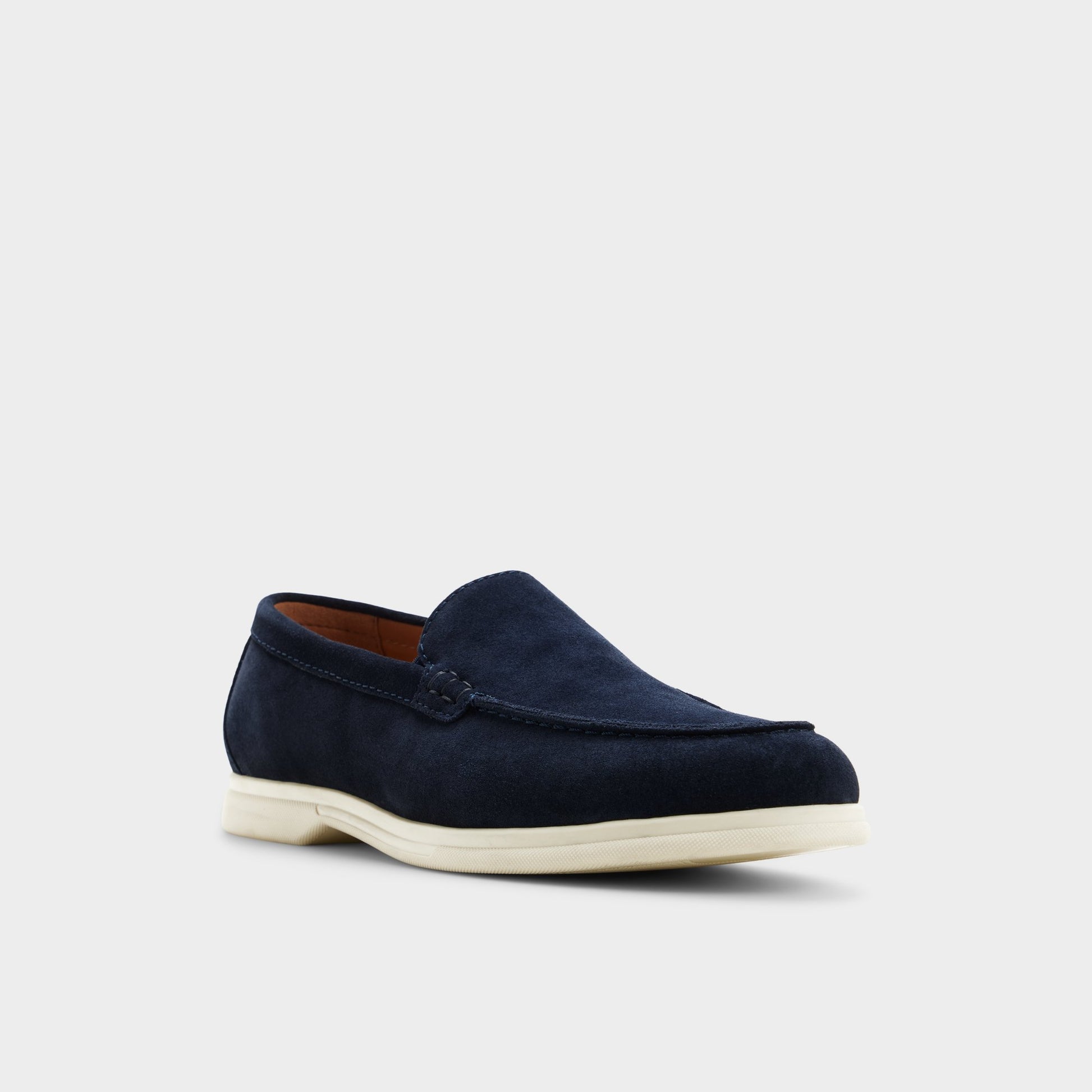 Three-quarter angle of Navy Dolan Slip-on's front side