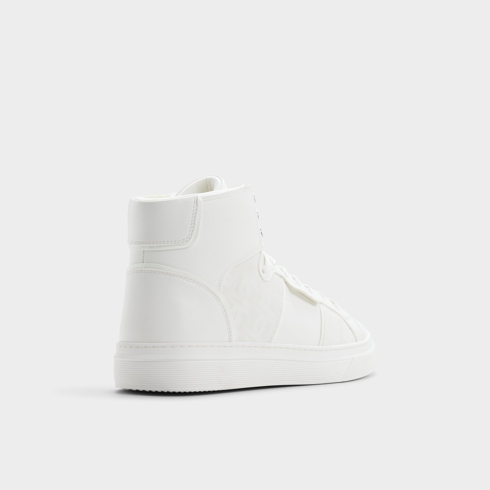 Three-quarter angle of White Jenner High top sneaker's back side