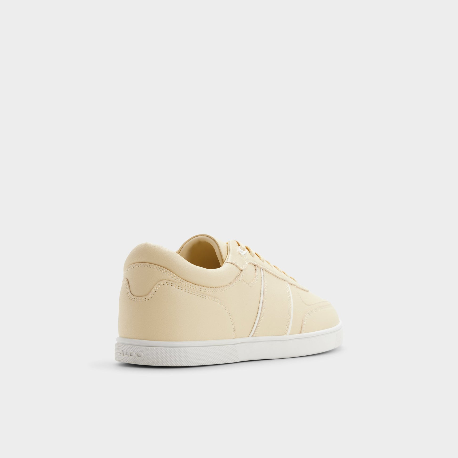 Three-quarter angle of Light yellow Whirl Low top sneaker's back side