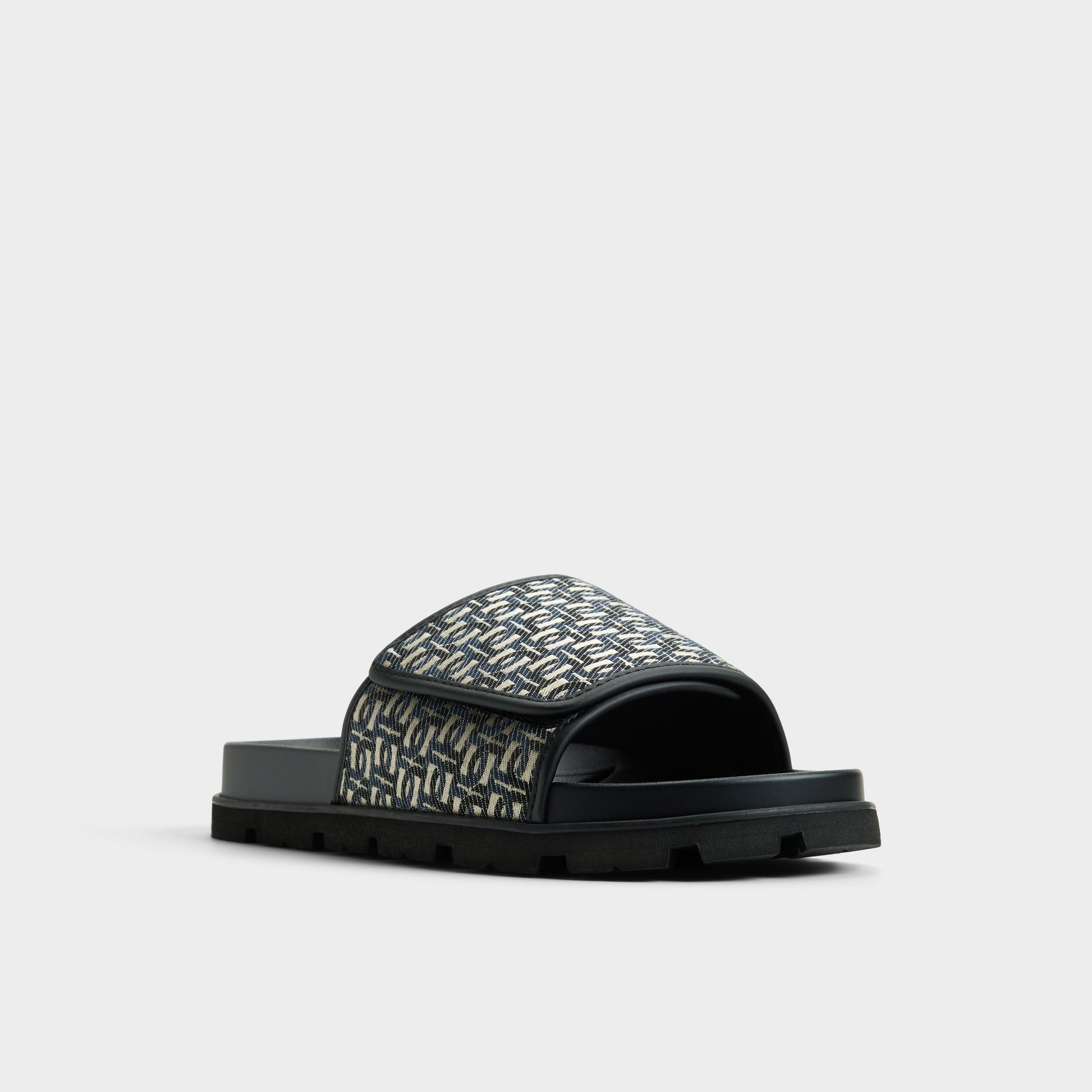 Three-quarter angle of Open black Orian Slide sandal's front side