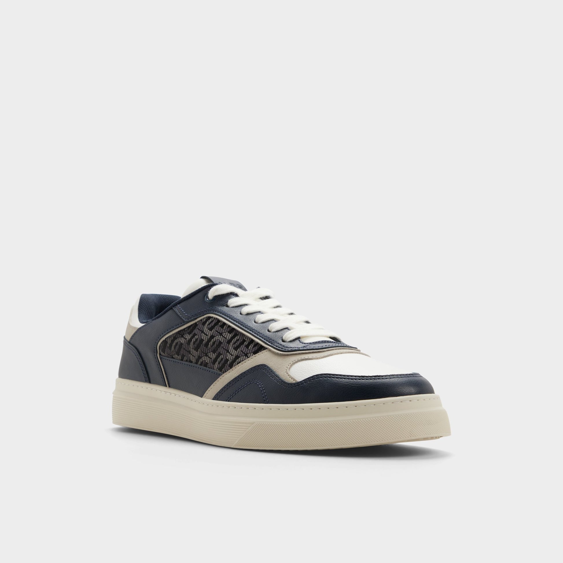 Three-quarter angle of Navy Desmond Low top sneaker's front side