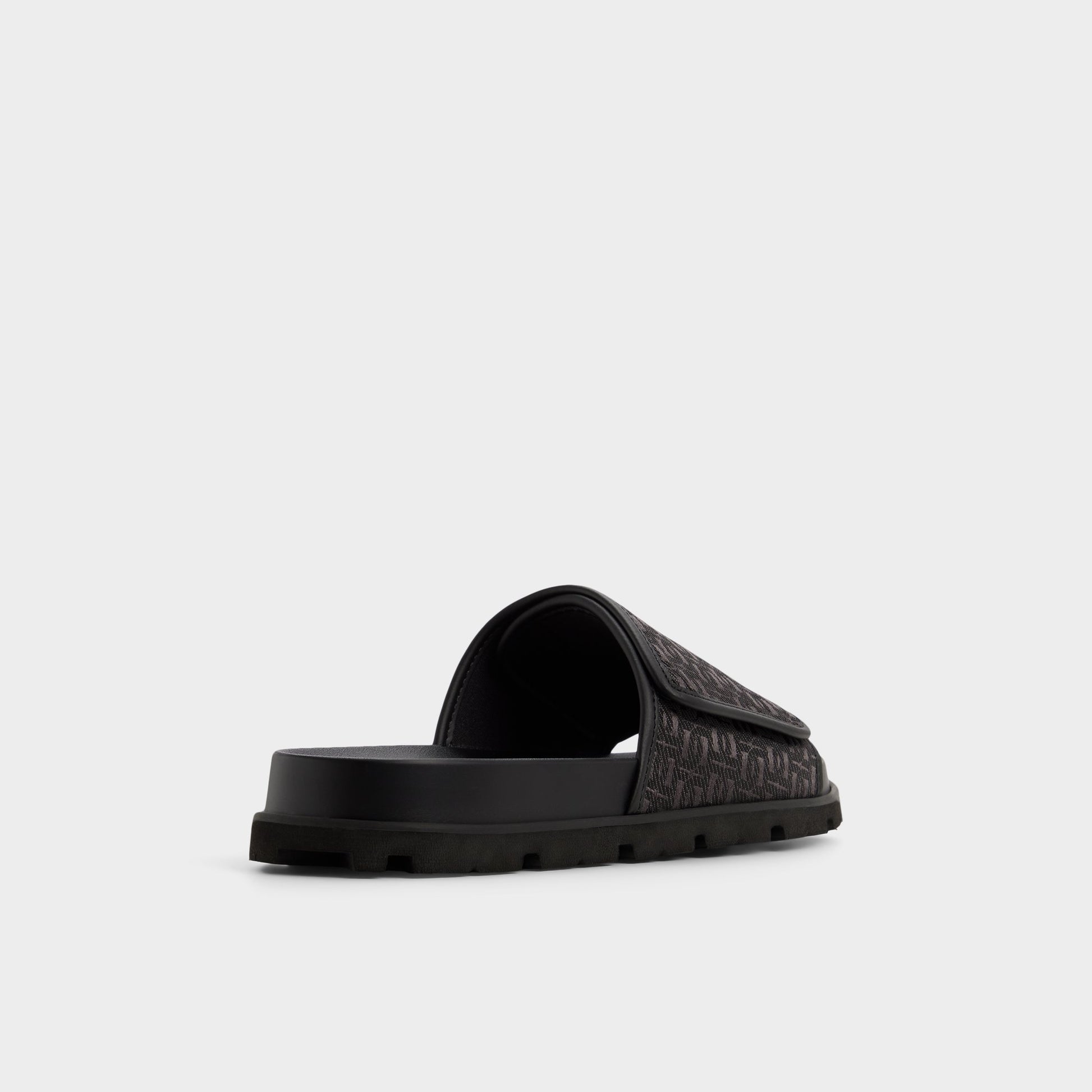 Three-quarter angle of Black Orian Slide sandal's back side