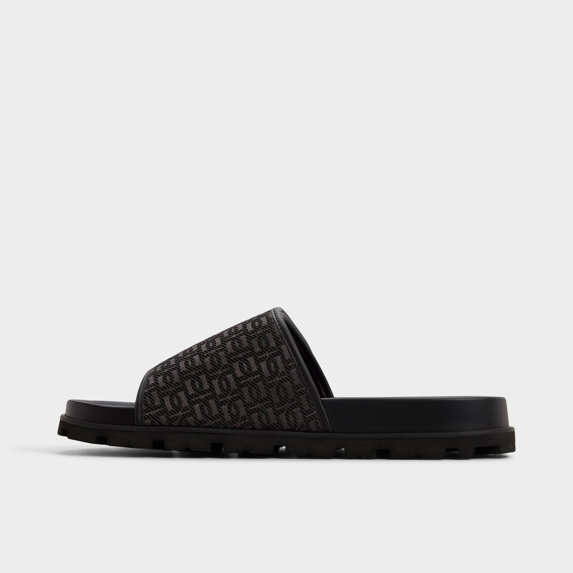 Side view of Black Orian Slide sandal
