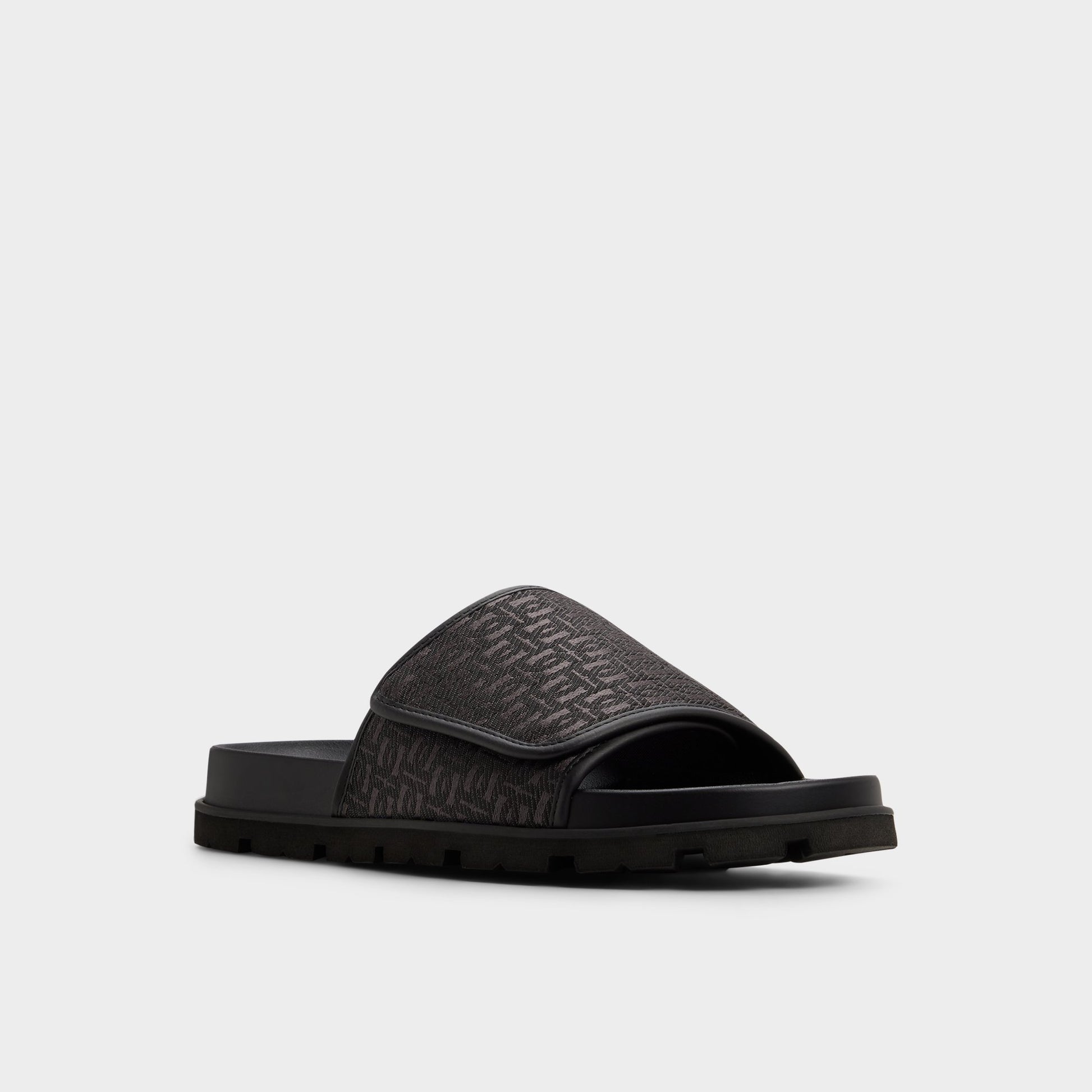 Three-quarter angle of Black Orian Slide sandal's front side