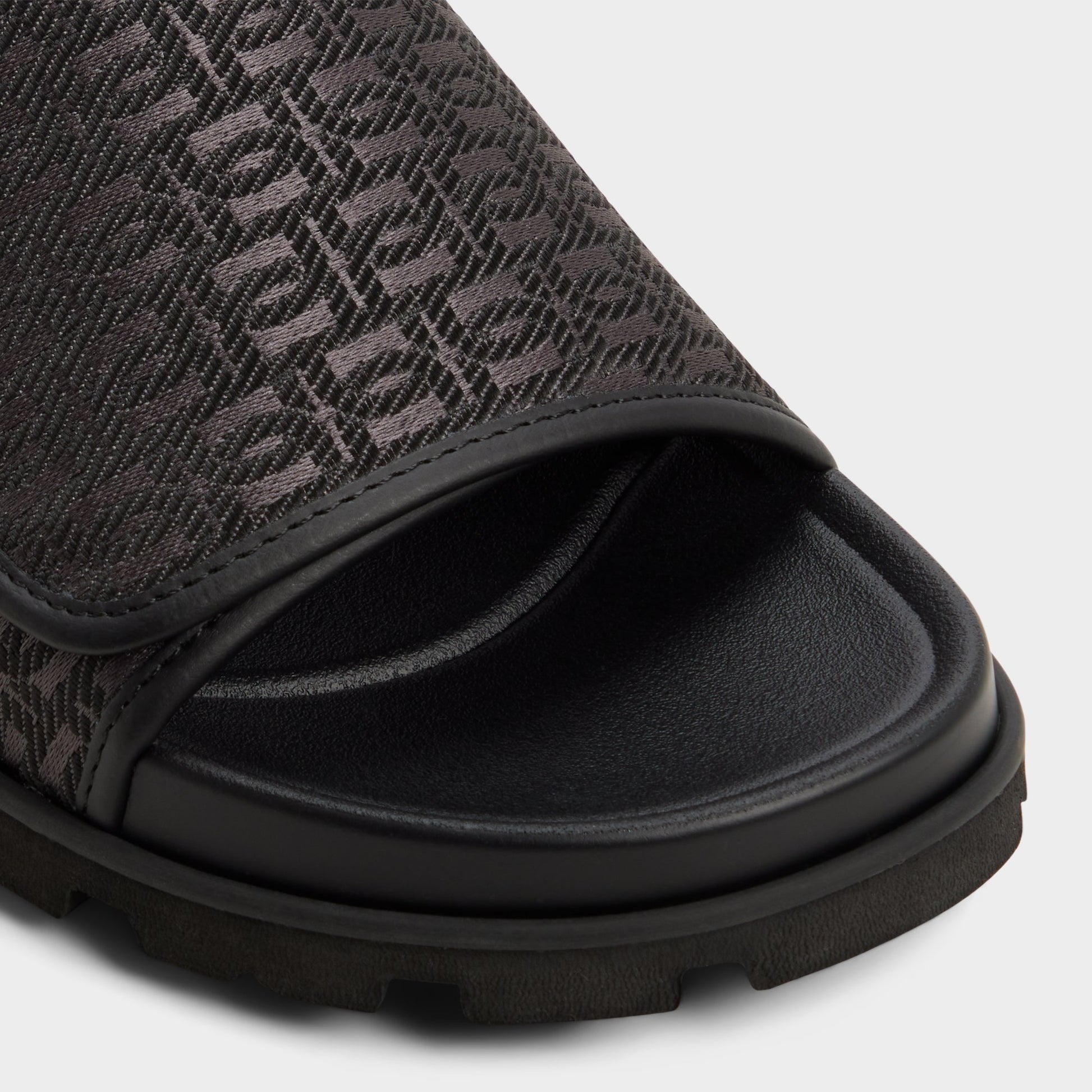Close-up of the Black Orian Slide sandal
