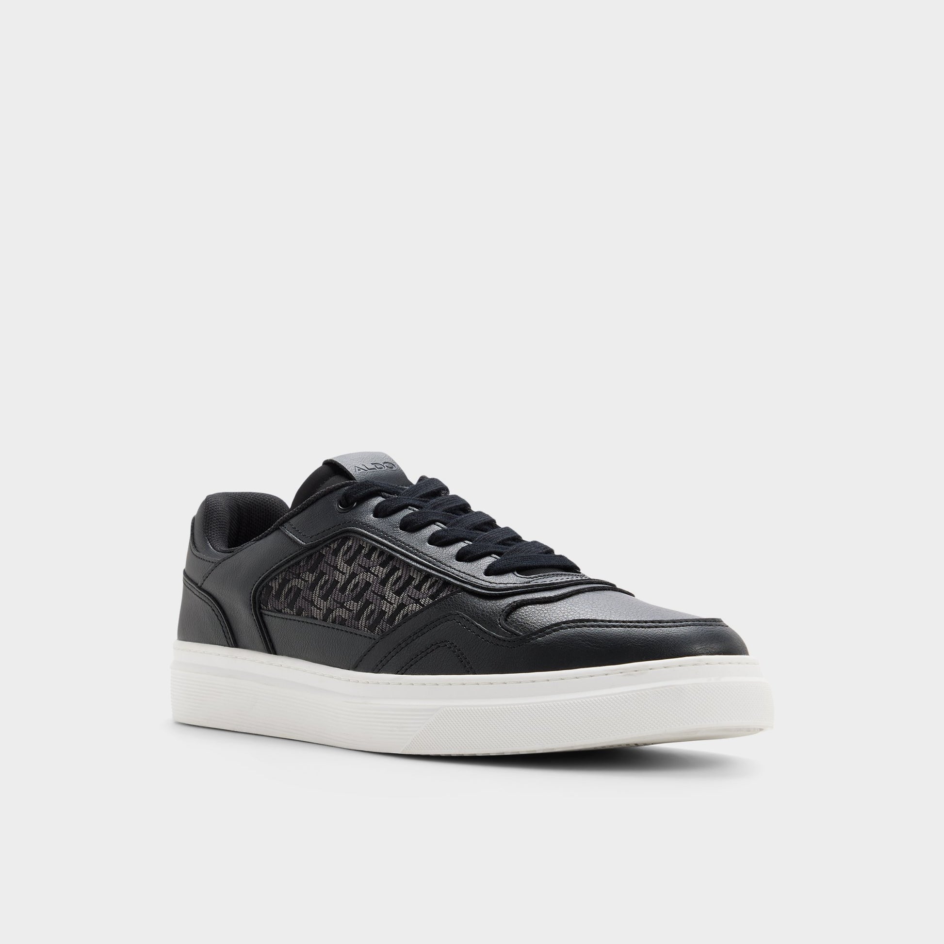 Three-quarter angle of Black Desmond Low top sneaker's front side