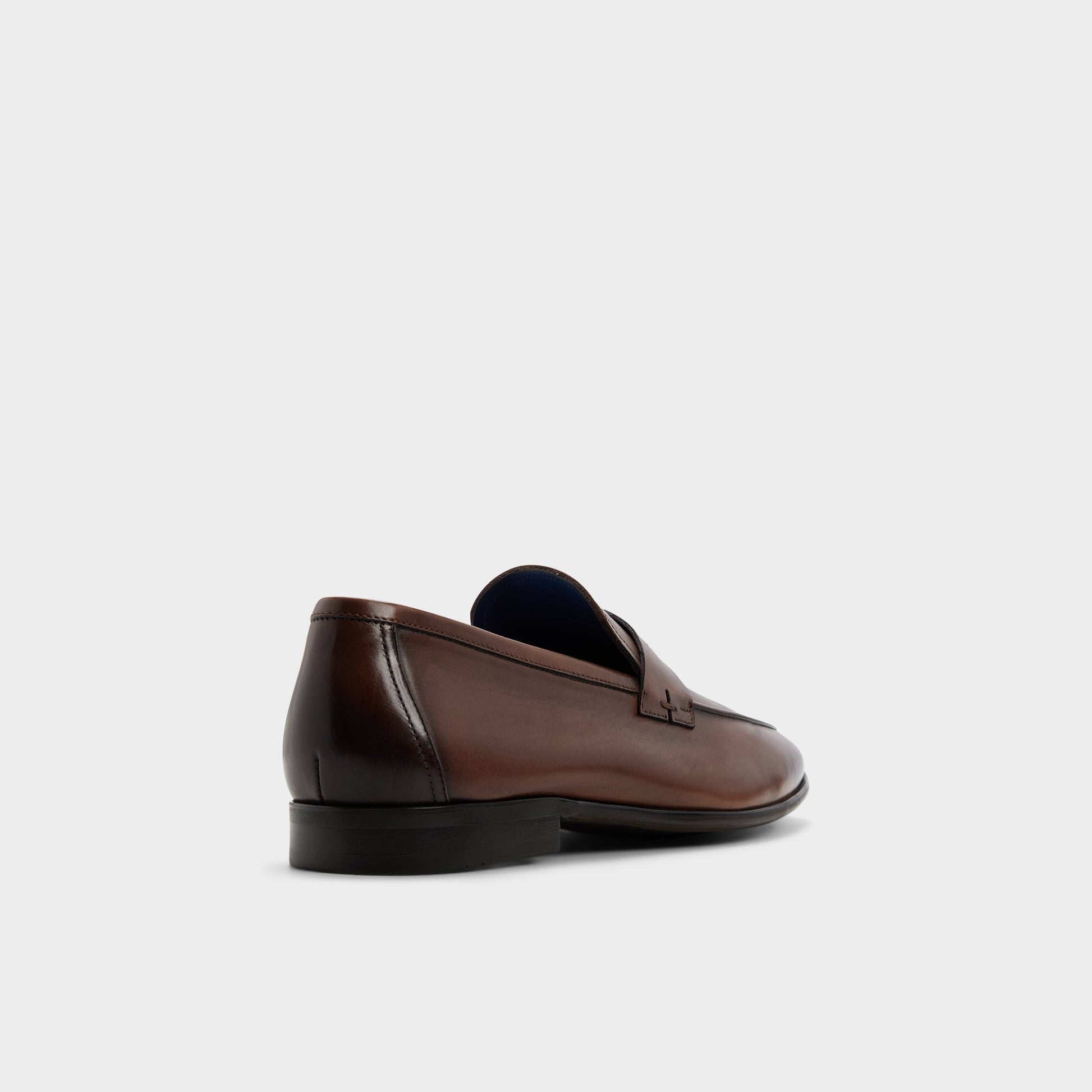 Three-quarter angle of Cognac Frazer Loafer's back side