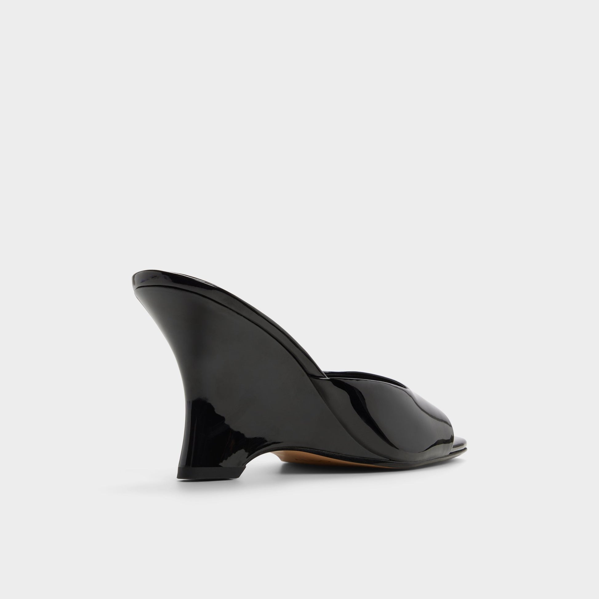 Three-quarter angle of Black Luminae Wedge sandal's back side