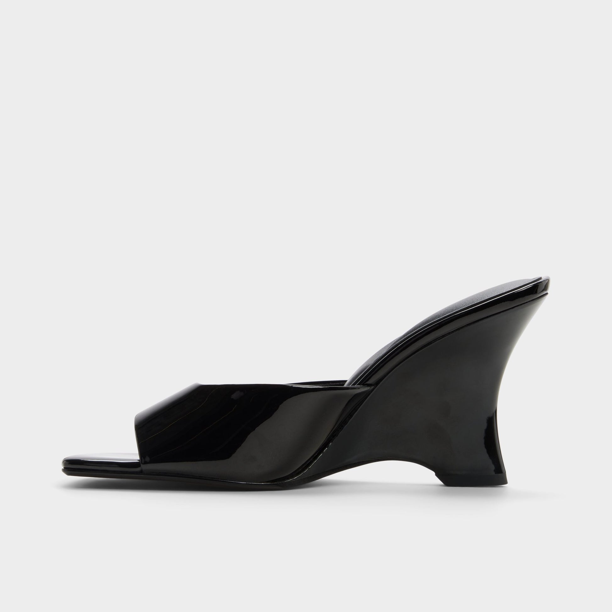 Side view of Black Luminae Wedge sandal