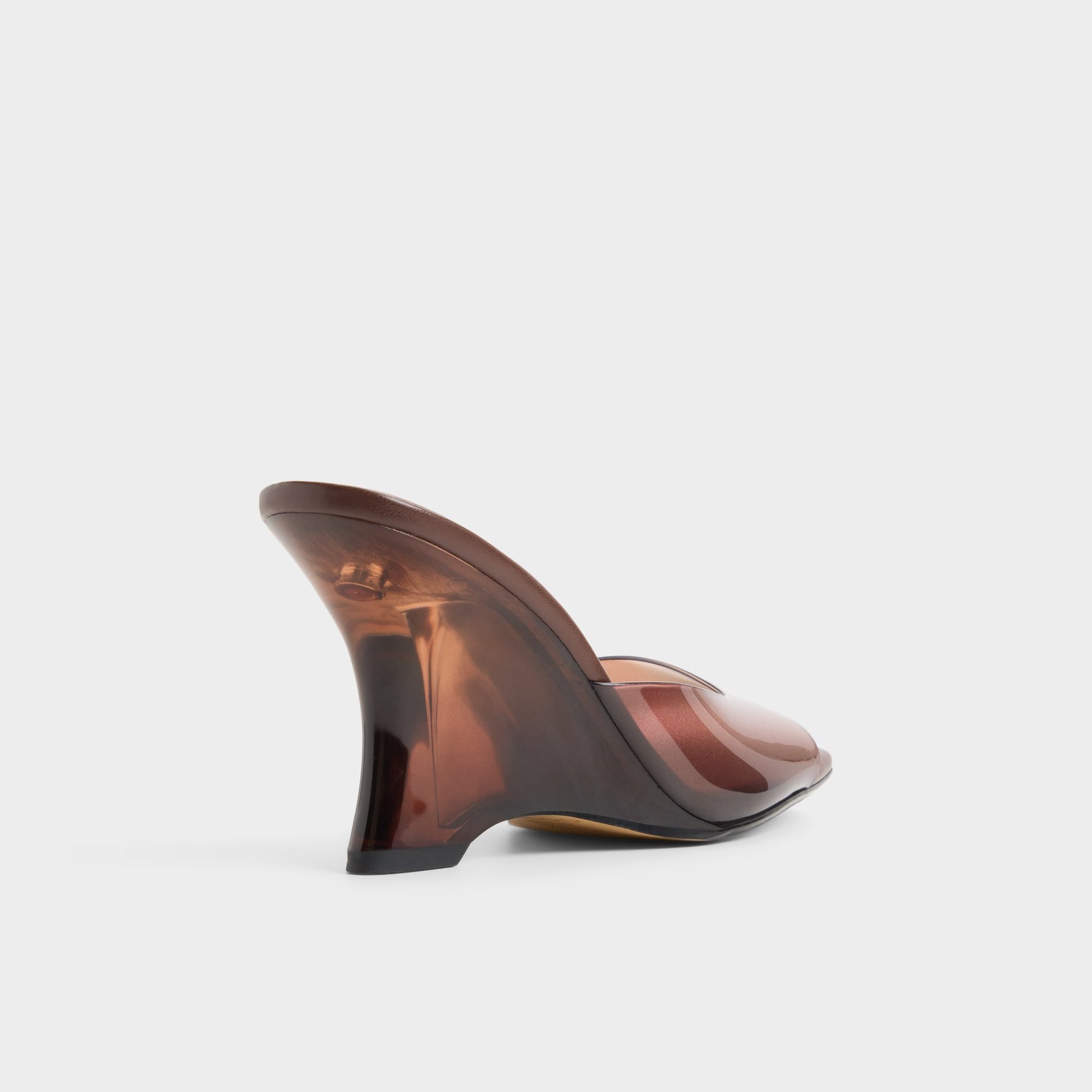 Three-quarter angle of Dark brown Lumina Wedge sandal's back side