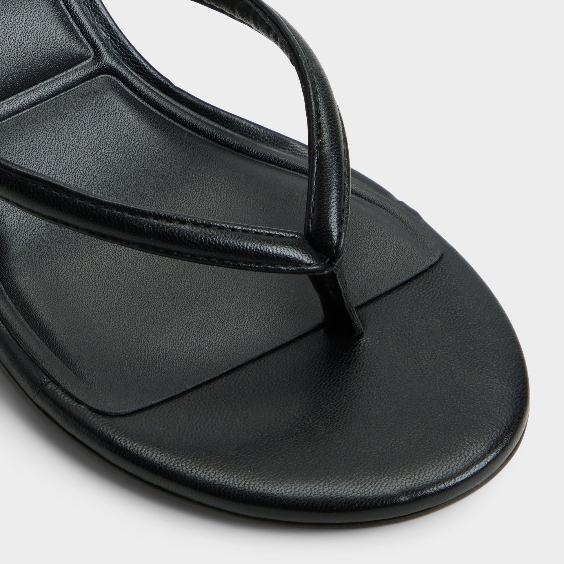 Close-up of the Black Skip Heeled flip flop